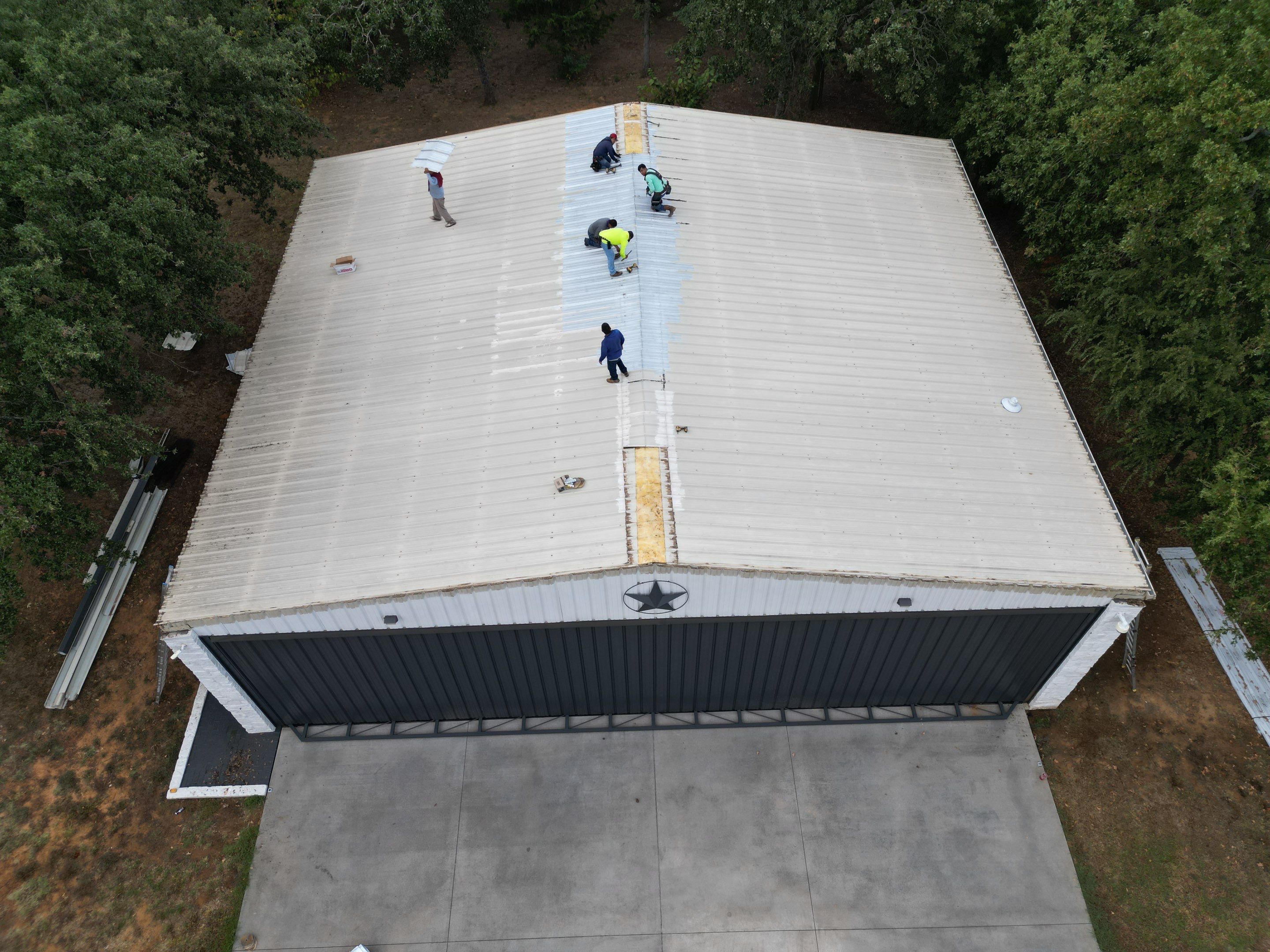 R-Panel Replacement by First Out Roofing 