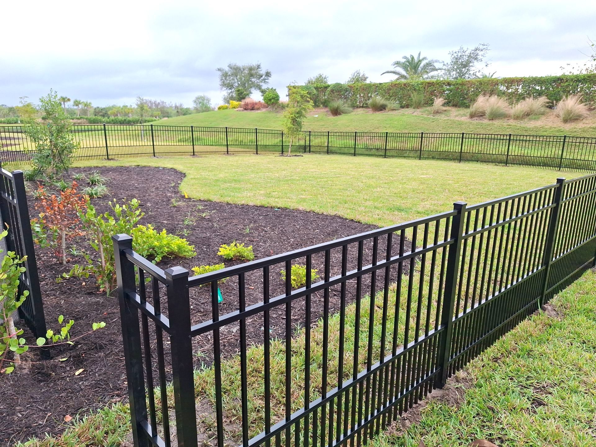 Aluminum Fence Installation using 4ft 3 Rail Black Aluminum Fence by Asap fence and gates, LLC