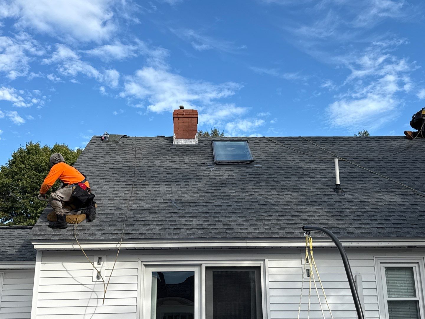 Complete Roof Replacement with GAF Pewter Gray HDZ™ Shingles, VELUX Skylights & New Gutters by Sensible Home Solutions