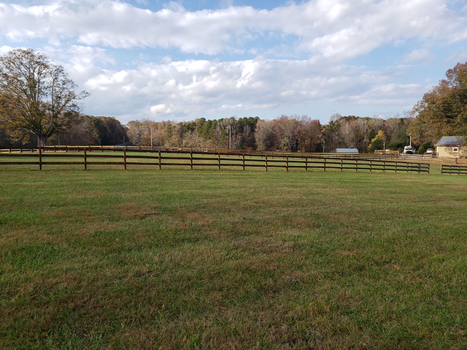 Fence Staining (Farm in Durham NC) by GonzalezPainters & Contractors Inc 