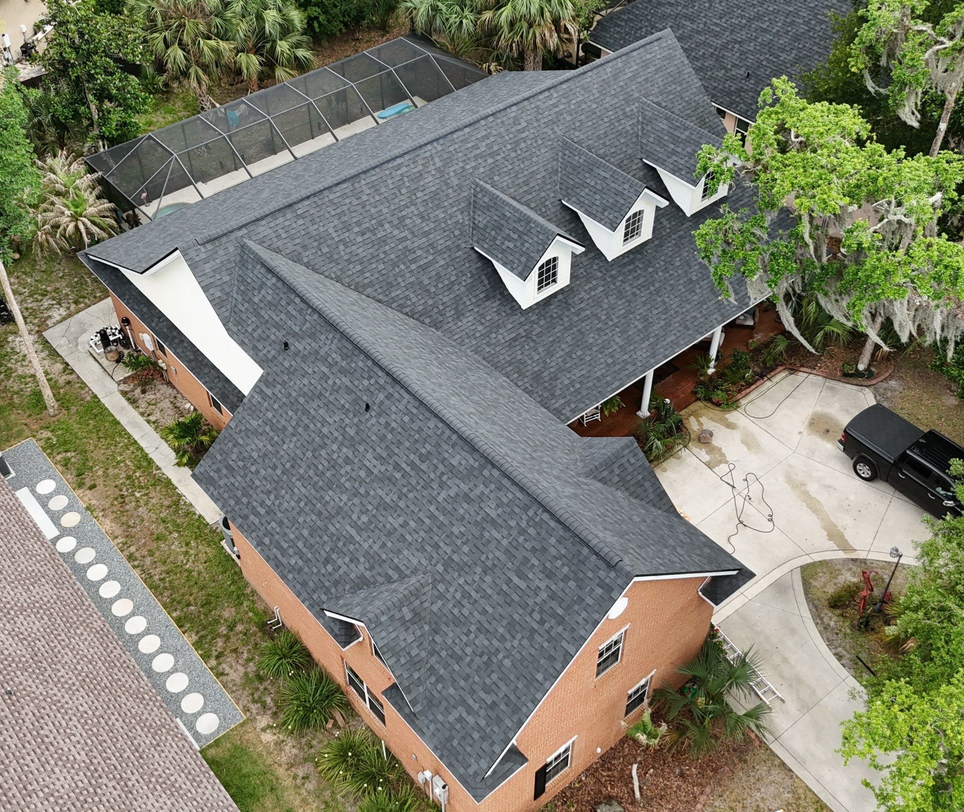Comprehensive Onyx Black Asphalt Shingle Roof Replacement for Flagler Beach Residence