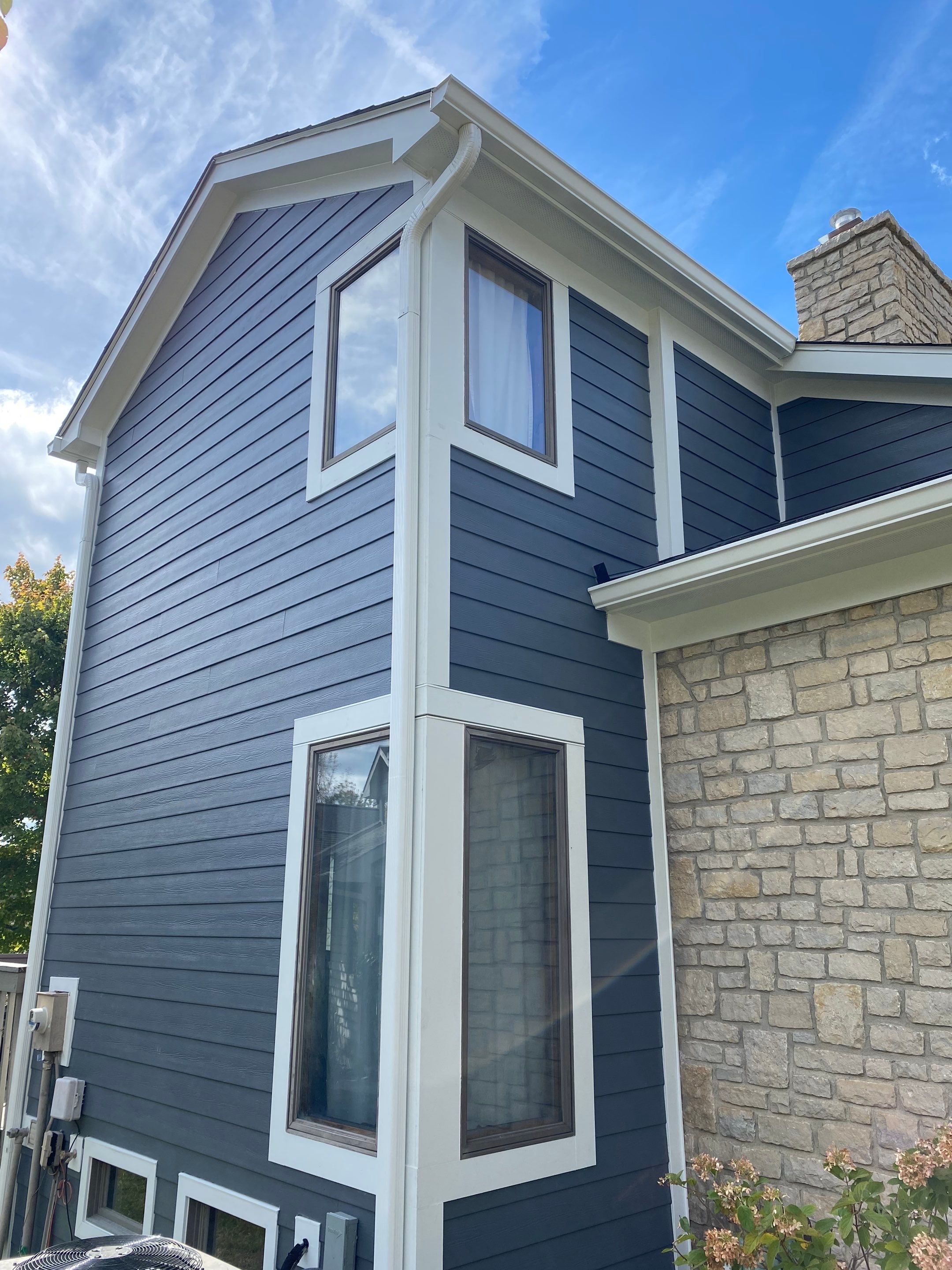 Siding Installation using James Hardie Fiber Cement Lap Siding by Best Exteriors Inc