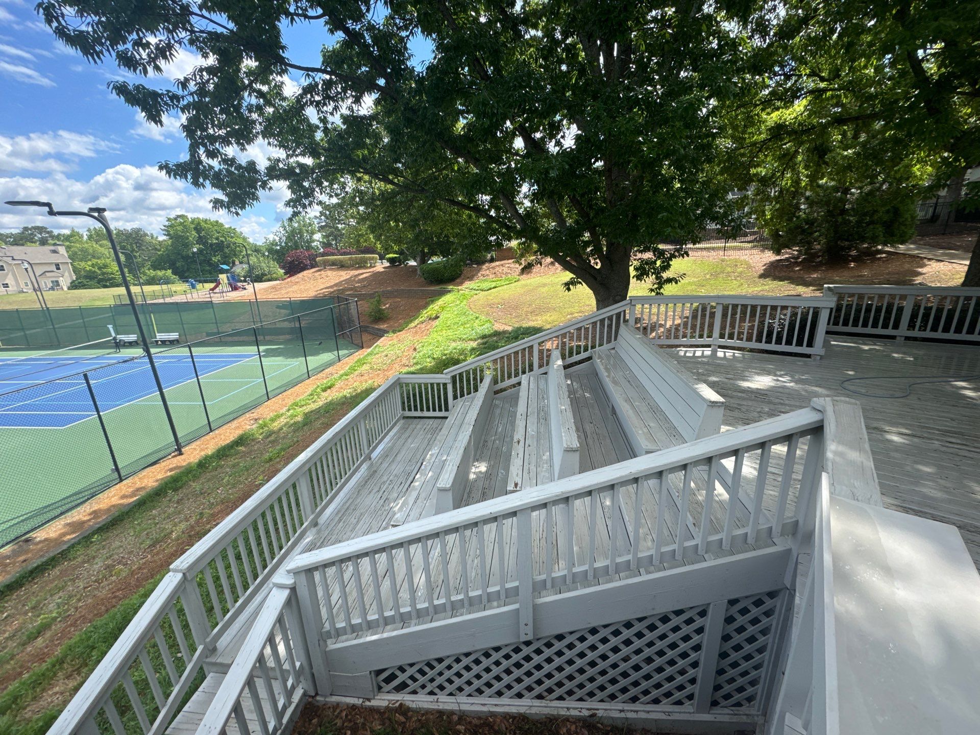 Exterior Deck and Pavilion Painting for Wexford Tennis Club in Roswell by Swift Home Renovations