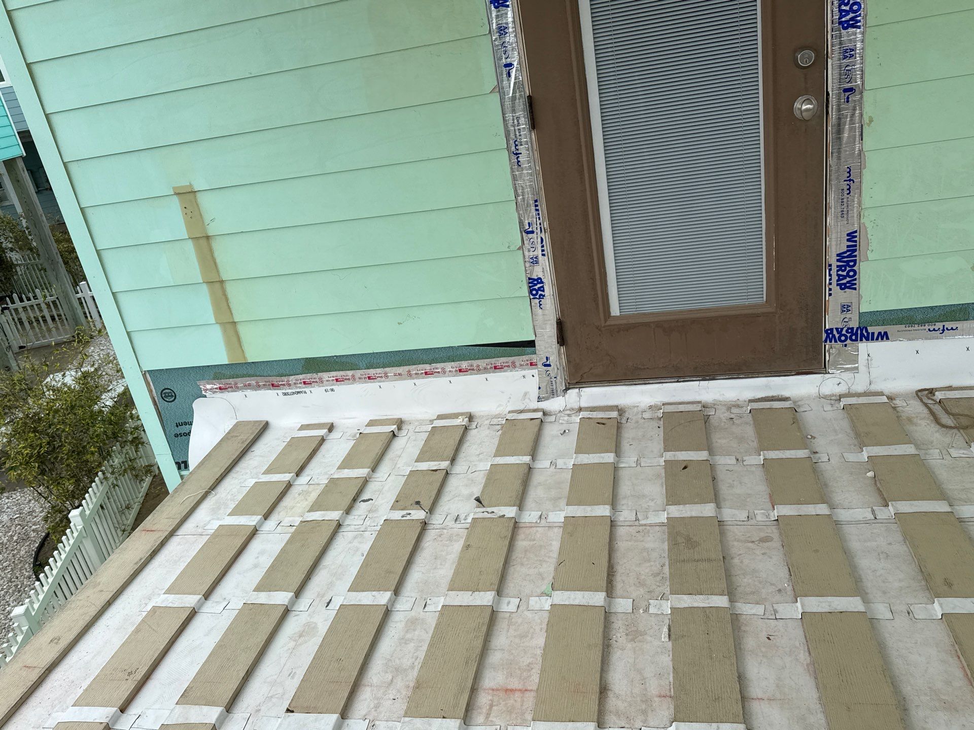 Walk Out Patio Cover by Bayfront Roofing and Construction