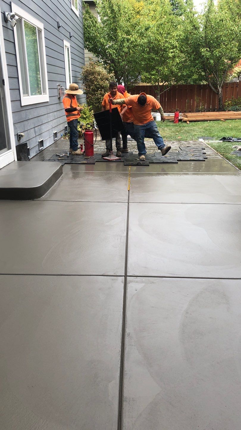  Amy | Stamped Finish Patio, Concrete Project by Jireh Asphalt & Concrete Inc 