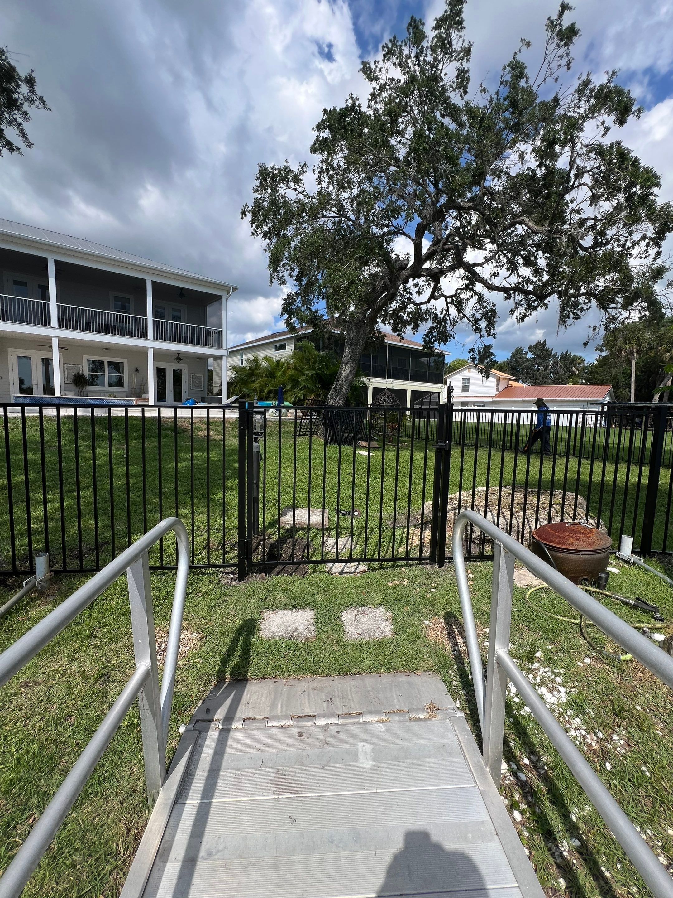 Aluminum Fence Installation using Black 3 Rail Aluminum Fence by Asap fence and gates, LLC