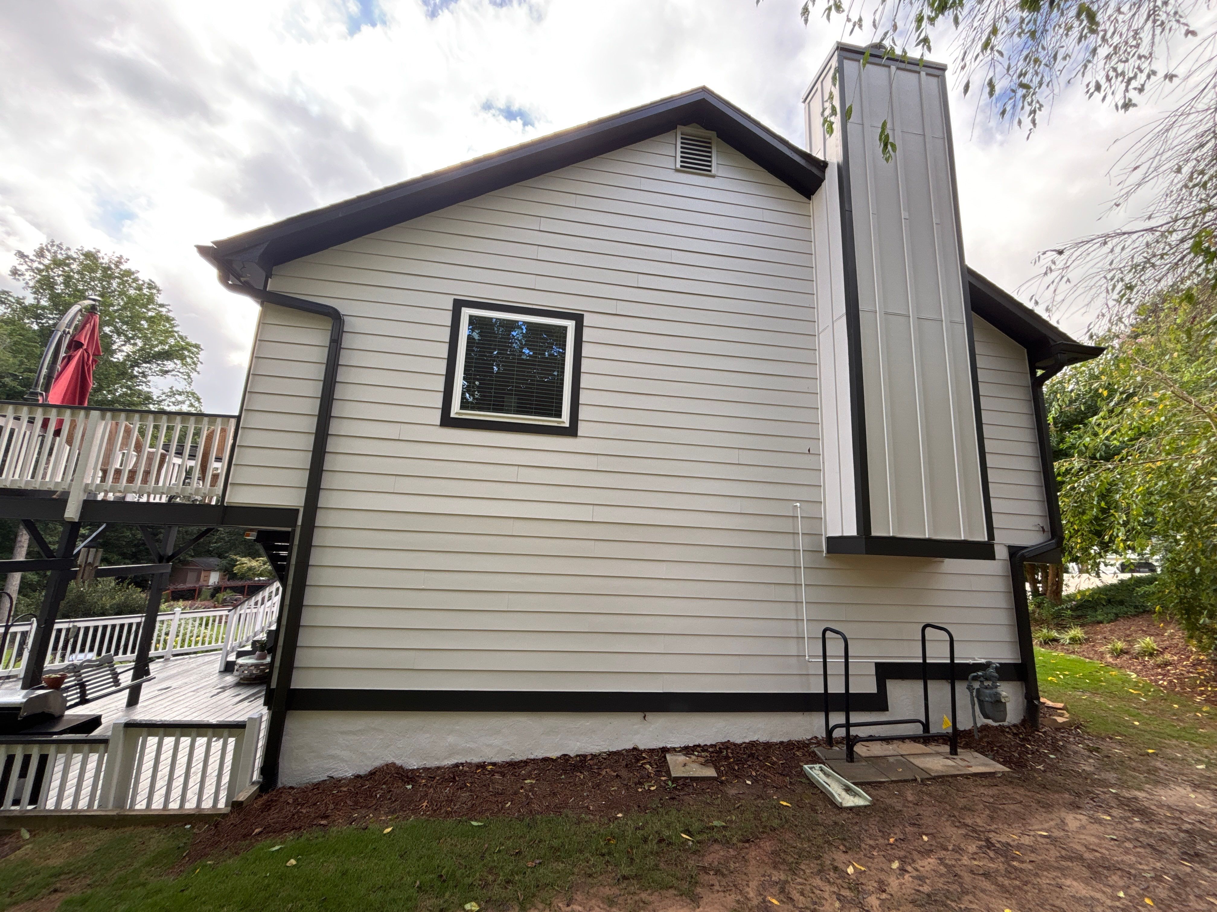 Siding replacement  by Deerfield Roofing LLC