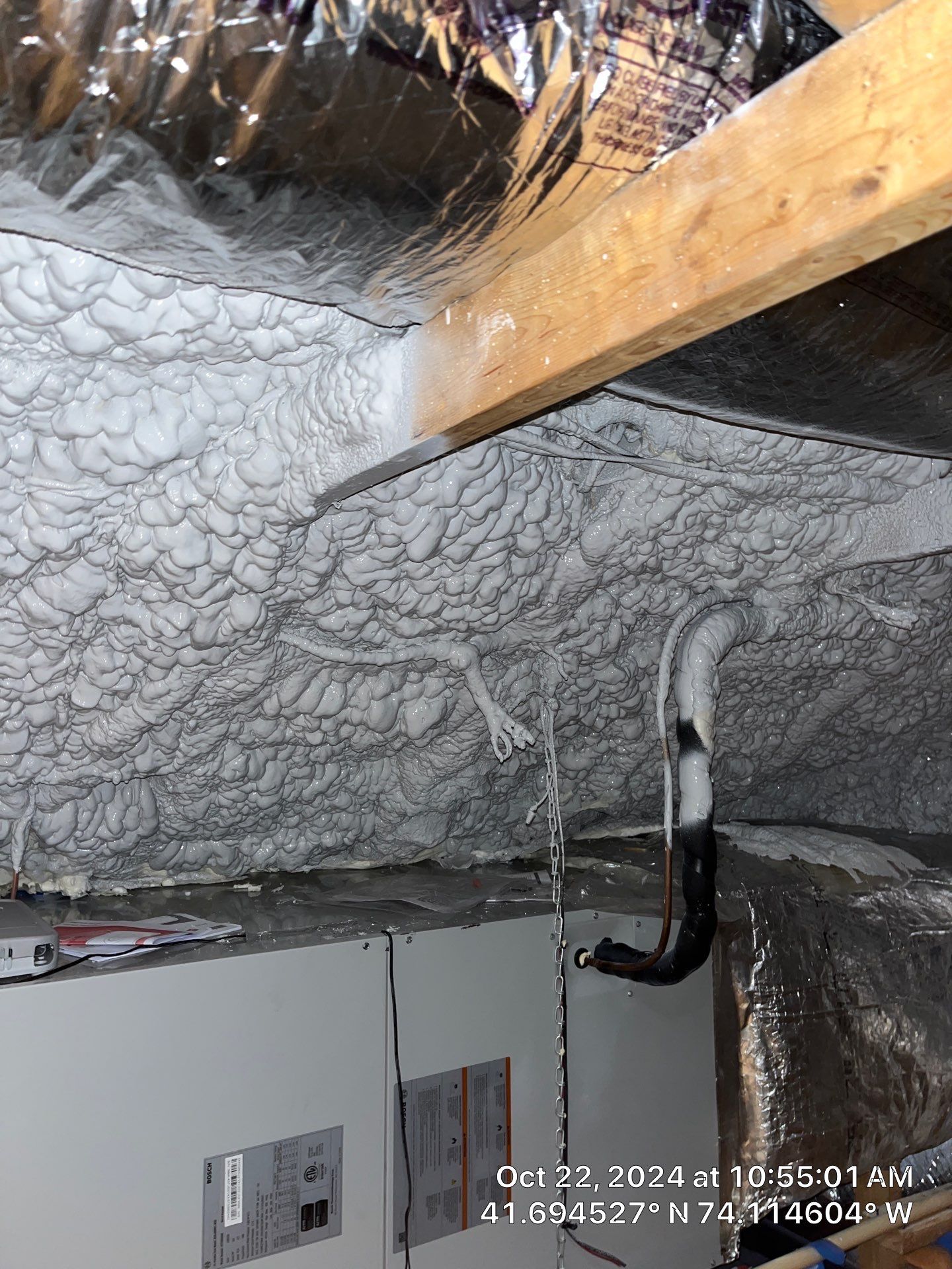 Attic Insulation using open cell spray foam by NYS Foam & Energy