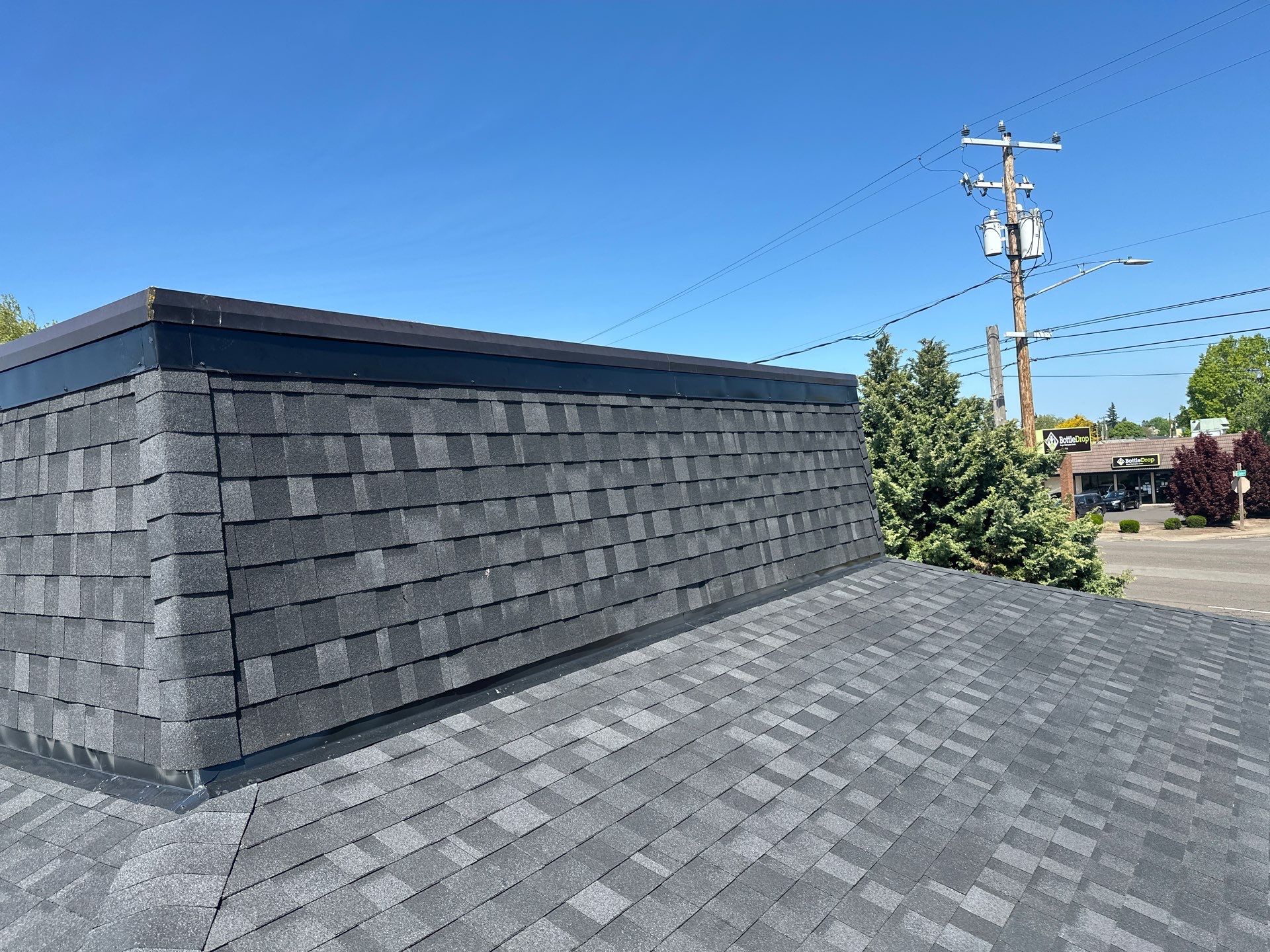 Granite Black Sizzler Albany Oregon Roof Replacement by Orezona Building & Roofing Company, Inc.