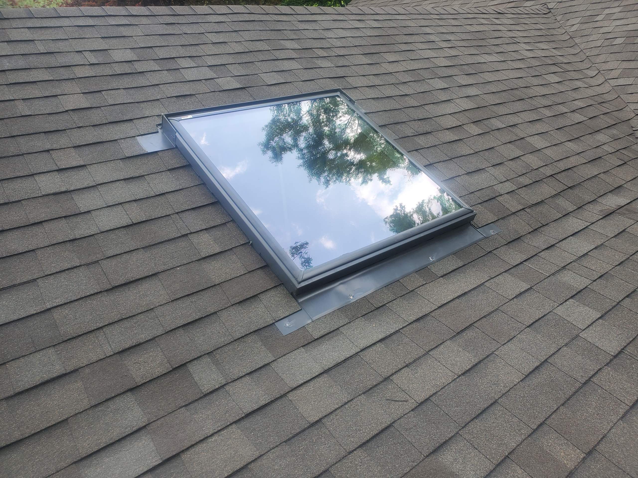 Architectural Shingle Roof Replacement with New Skylights in Memphis by Revival Roofing Services