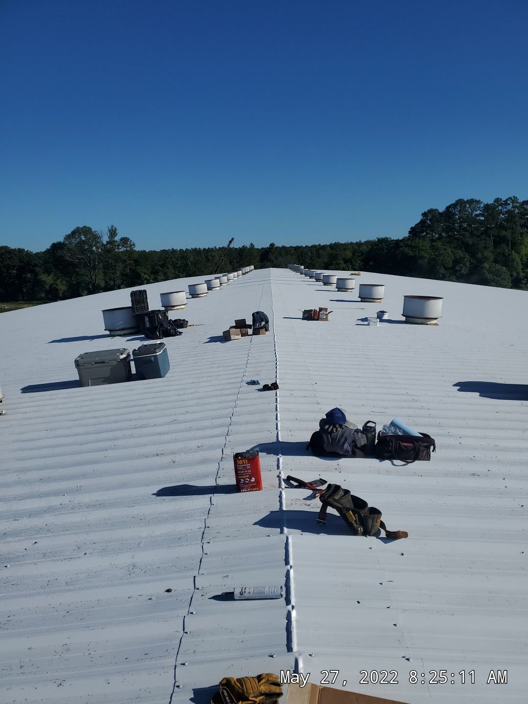 Commercial Roofing Installation using Aluminum Roofing panels by Hostetler Roofing