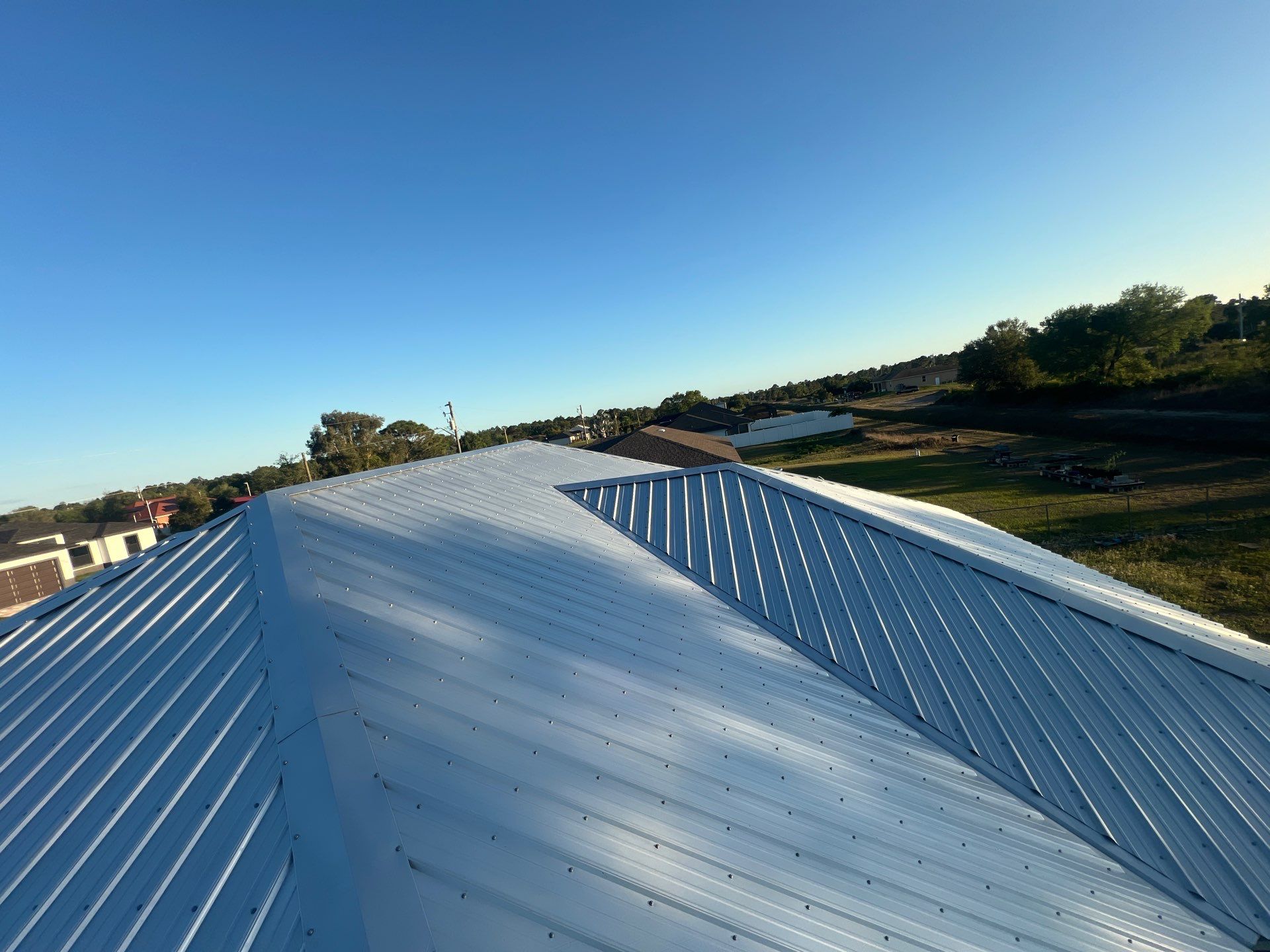Residential Roofing Installation using Durabull Classic Rib Panel by Durabilis Roofing INC