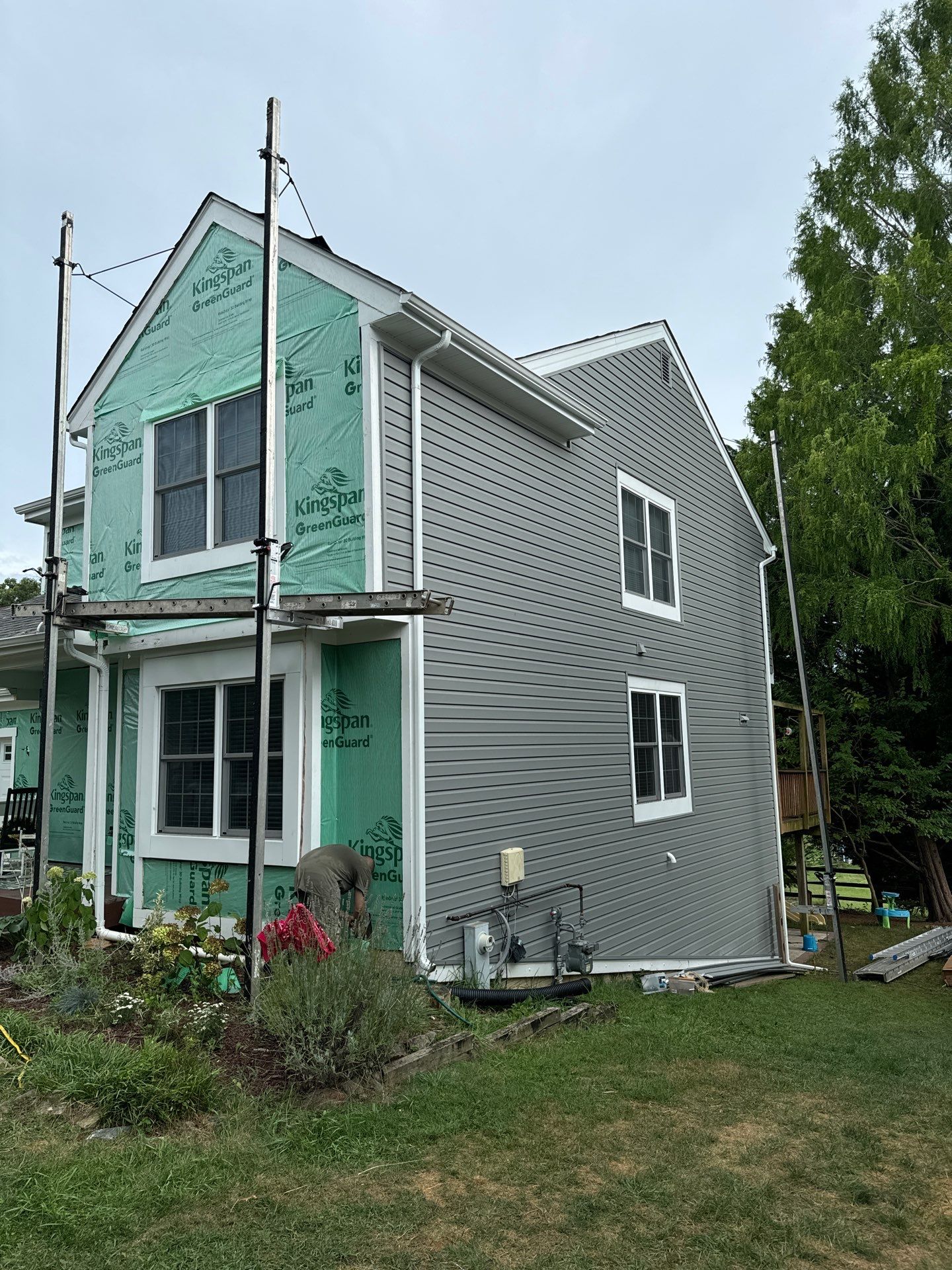 New Prodigy siding with One-piece insulated siding system & Exterior painting   by Alpha Design Services