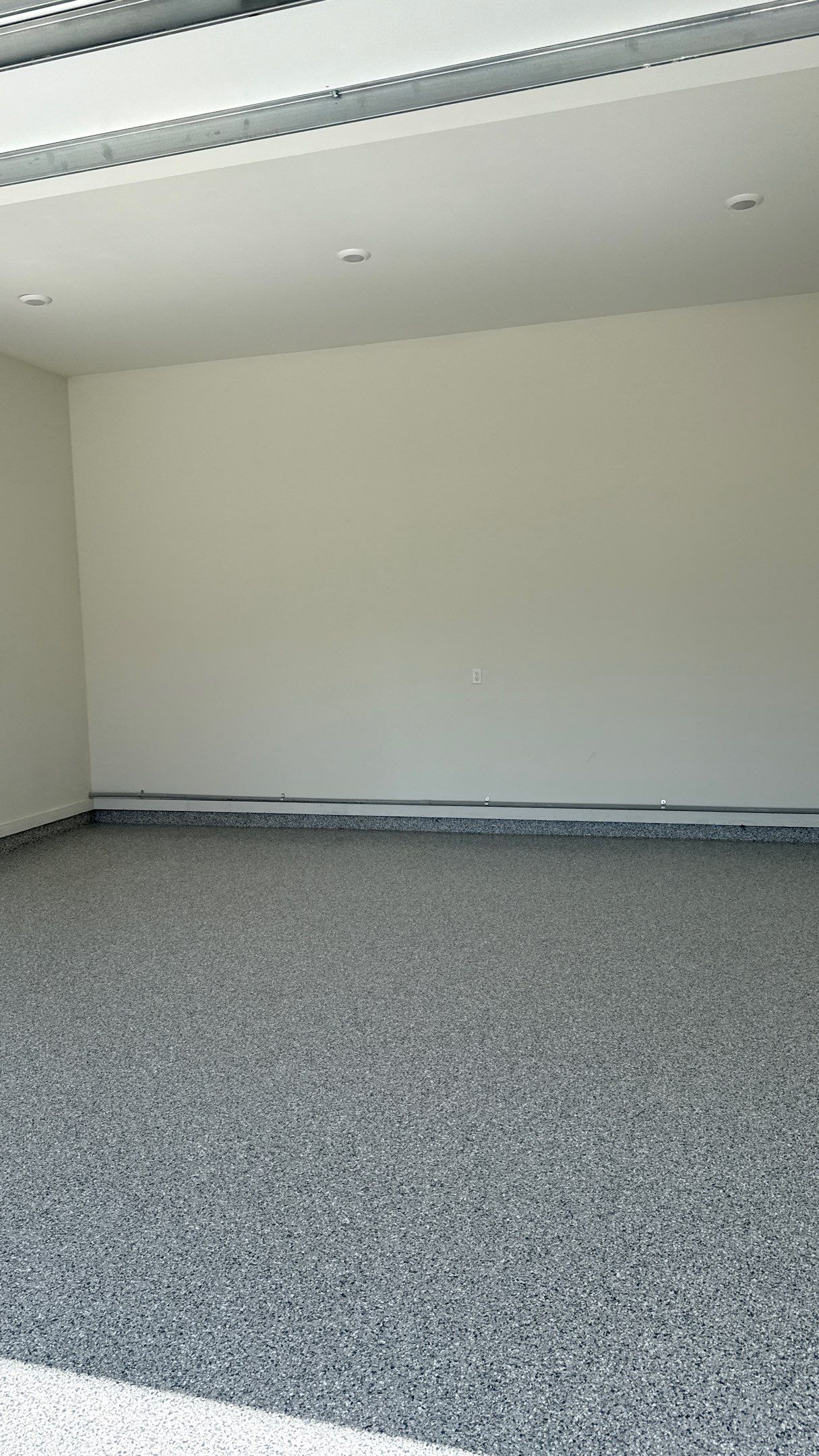 Garage Remodel with Custom Cabinets and Epoxy Floors in Overland Park by Banner Garage