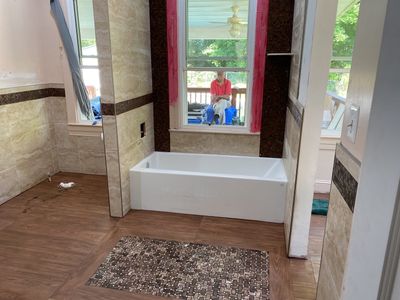 Bathroom Remodel using New Bathroom Tile and Tube