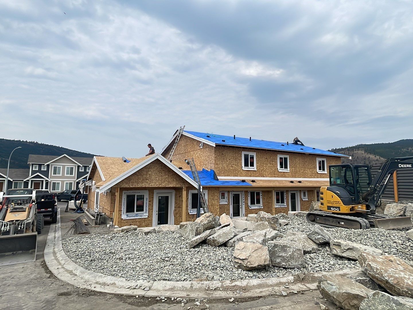 Residential Roofing Installation using OC Driftwood shingles by Top Notch Roofing Inc