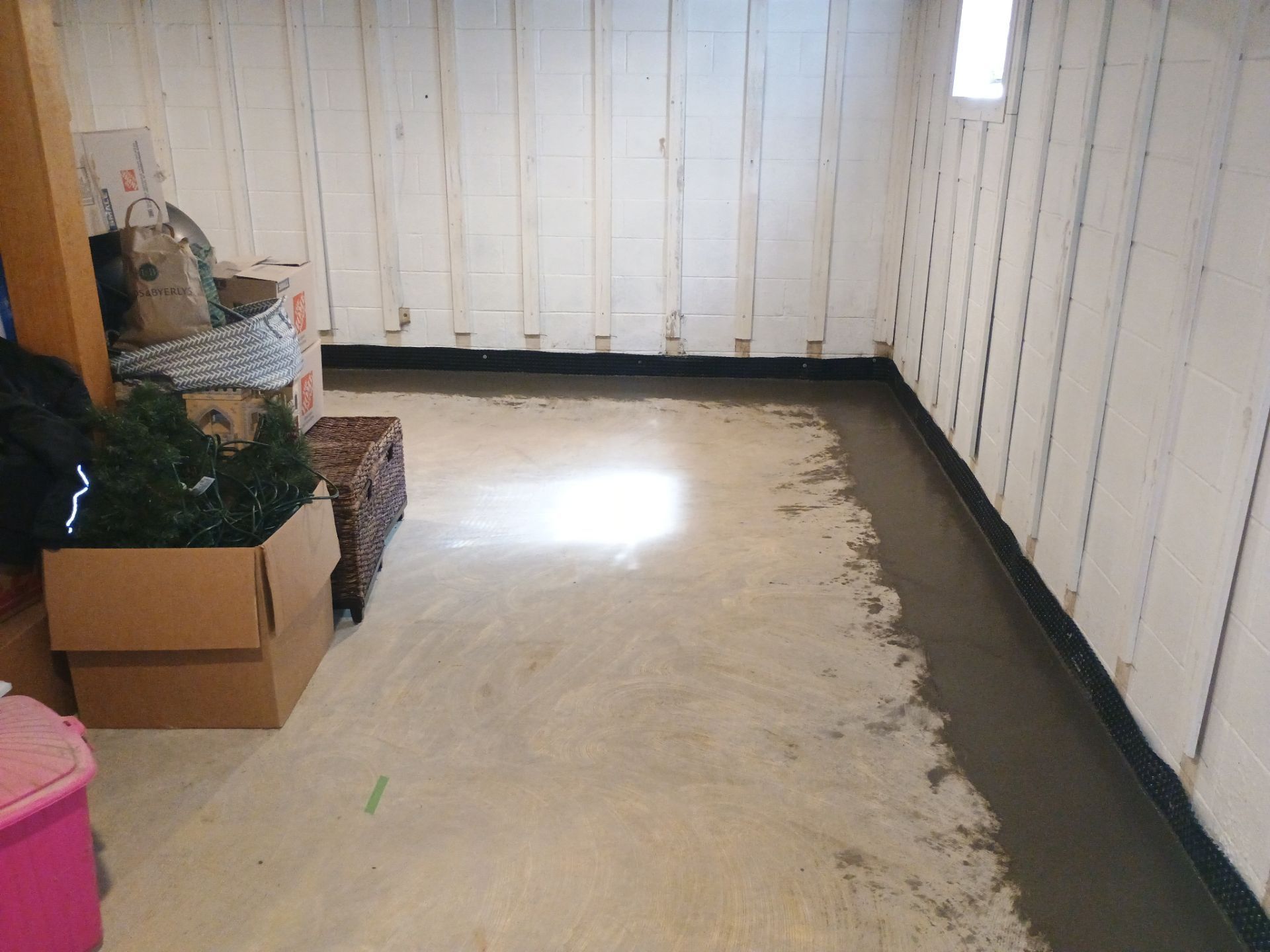 Interior Drain Tile & Buried Discharge in St. Anthony, MN by Waterproofing Northeast