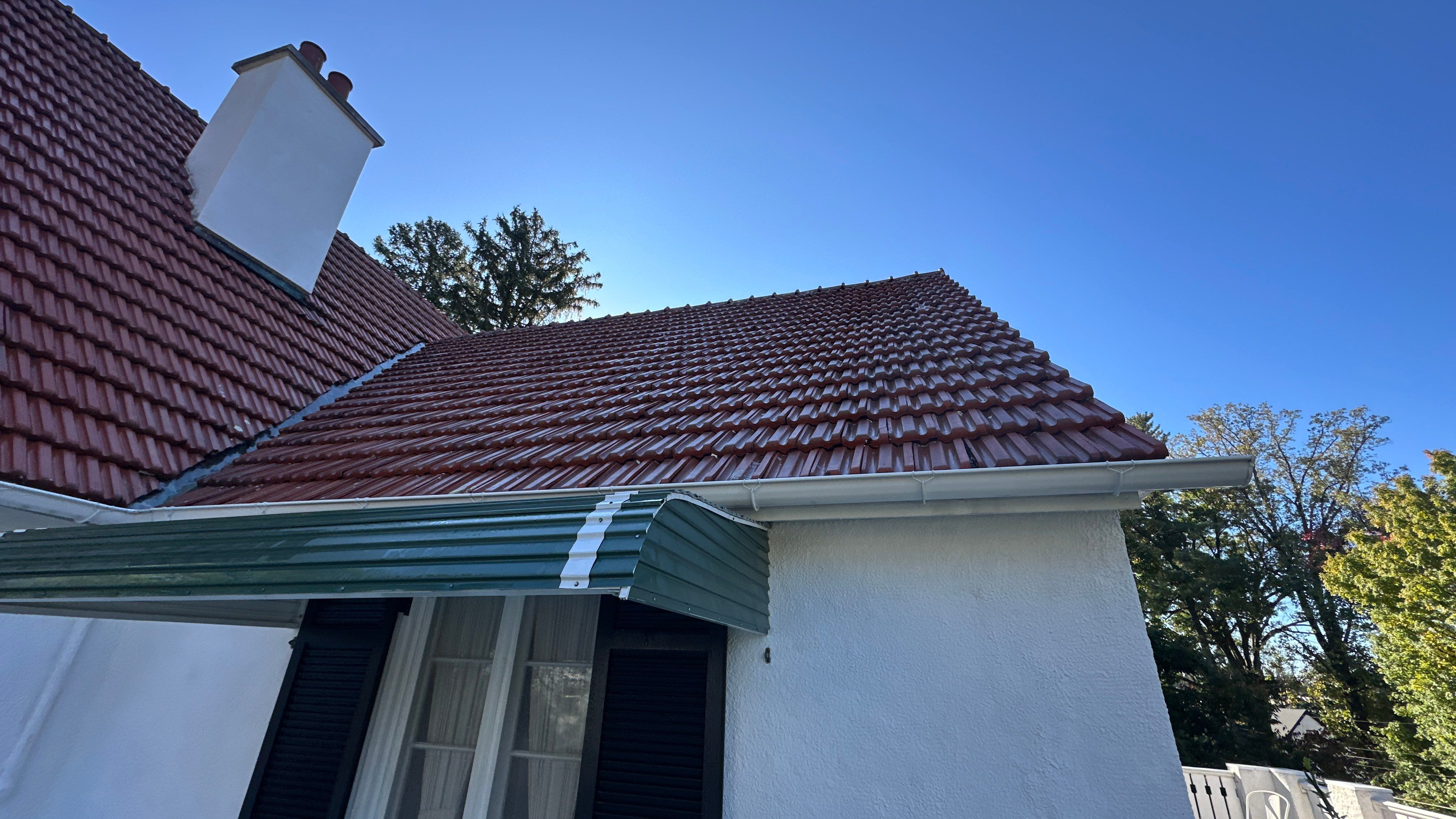 Stucco House Washing and Concrete Balcony Cleaning in Baltimore by Baltimore Pressure Washers Inc.