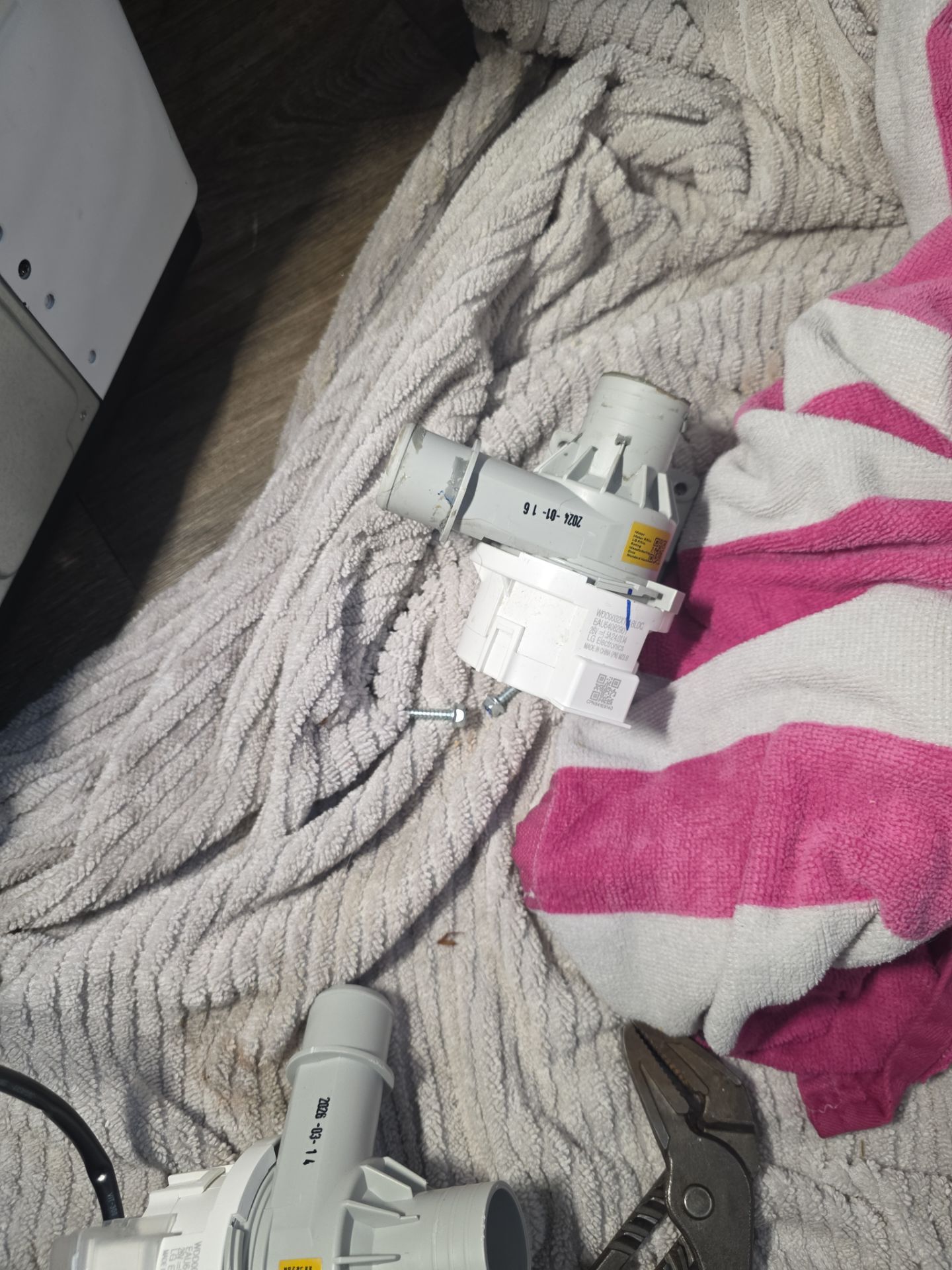 LG Top-Load Washing Machine Drain Pump Repair in Clermont by AMB-WORKS APPLIANCE REPAIR