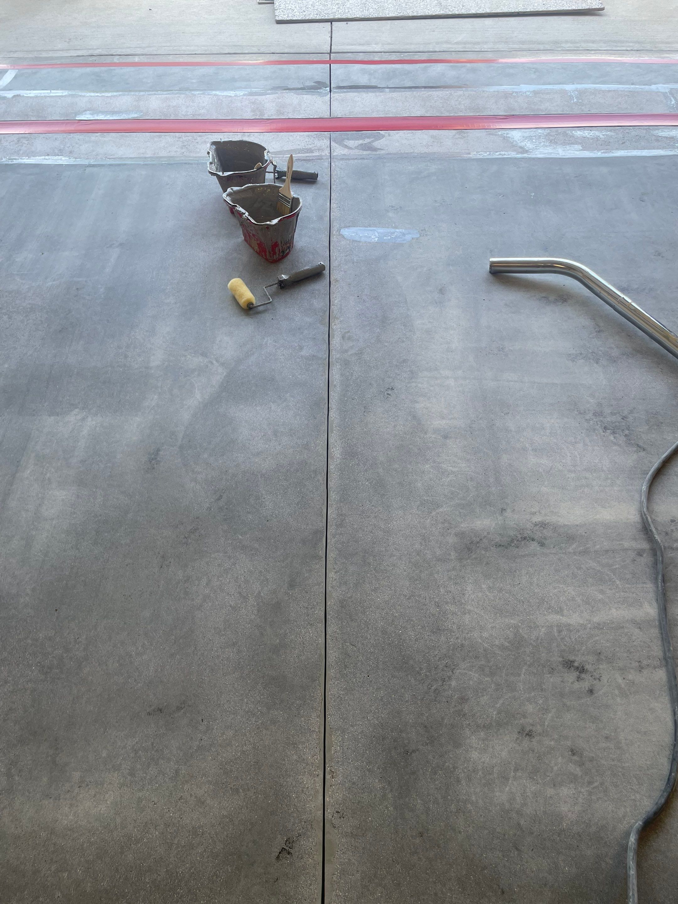 Multi-Stall Garage Floor Coating Installation in Sioux Falls by Select Painting, Coatings & Garage Cabinets