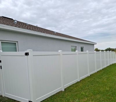 Vinyl Fence Installation using Vinyl Fence and Black 3 Rail Aluminum Fence