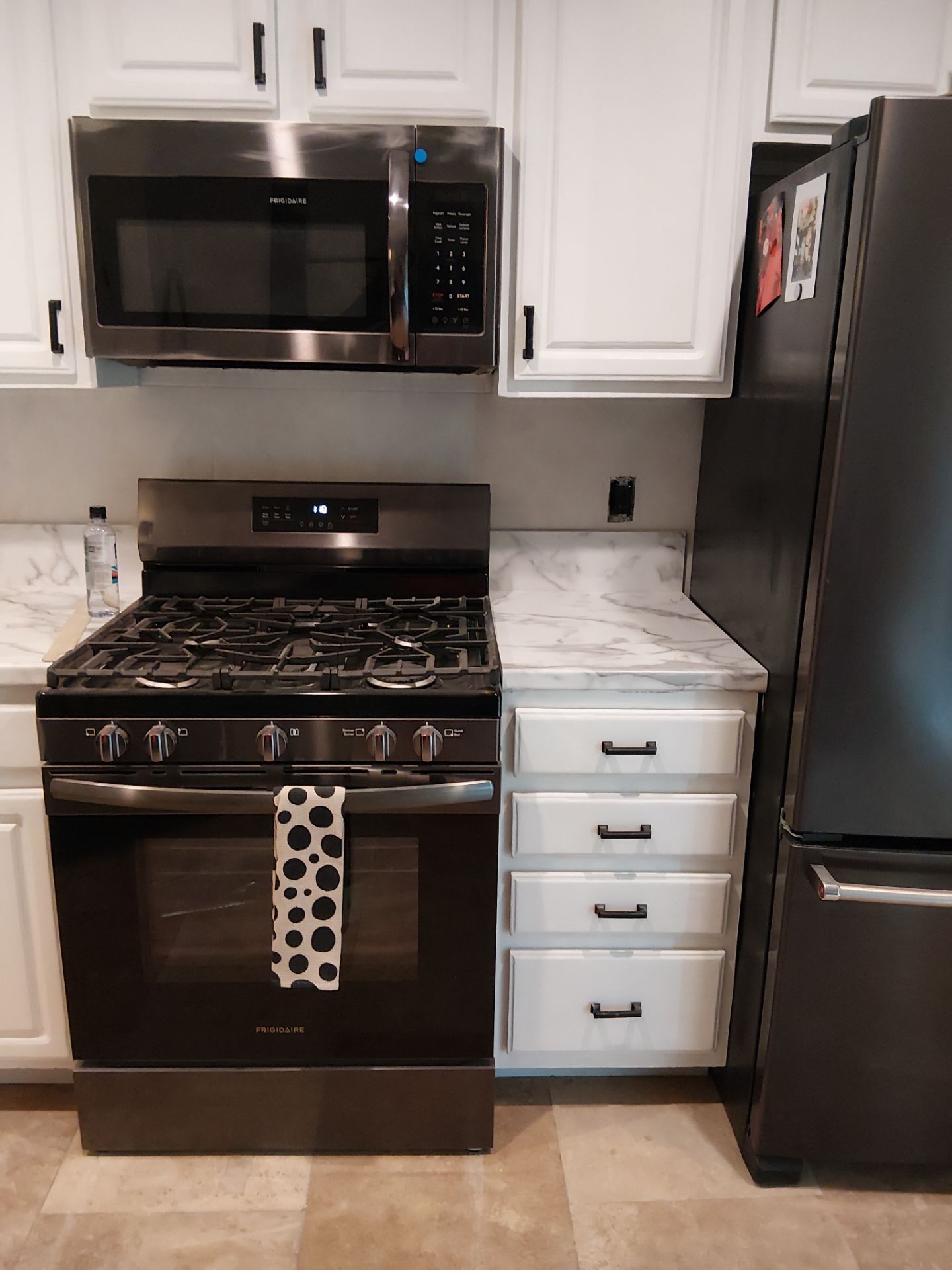 Kitchen Refresh and Hardwood Floor Restoration in Clayton by Legendary Services Company LLC.