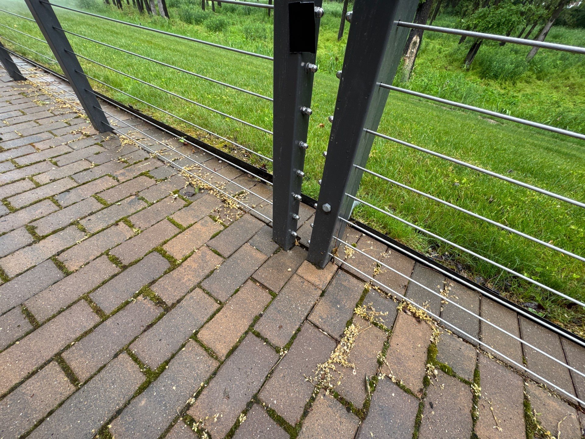 Brick paver repair, cleaning, sealing and poly sanding by Northern Power Washing LLC.
