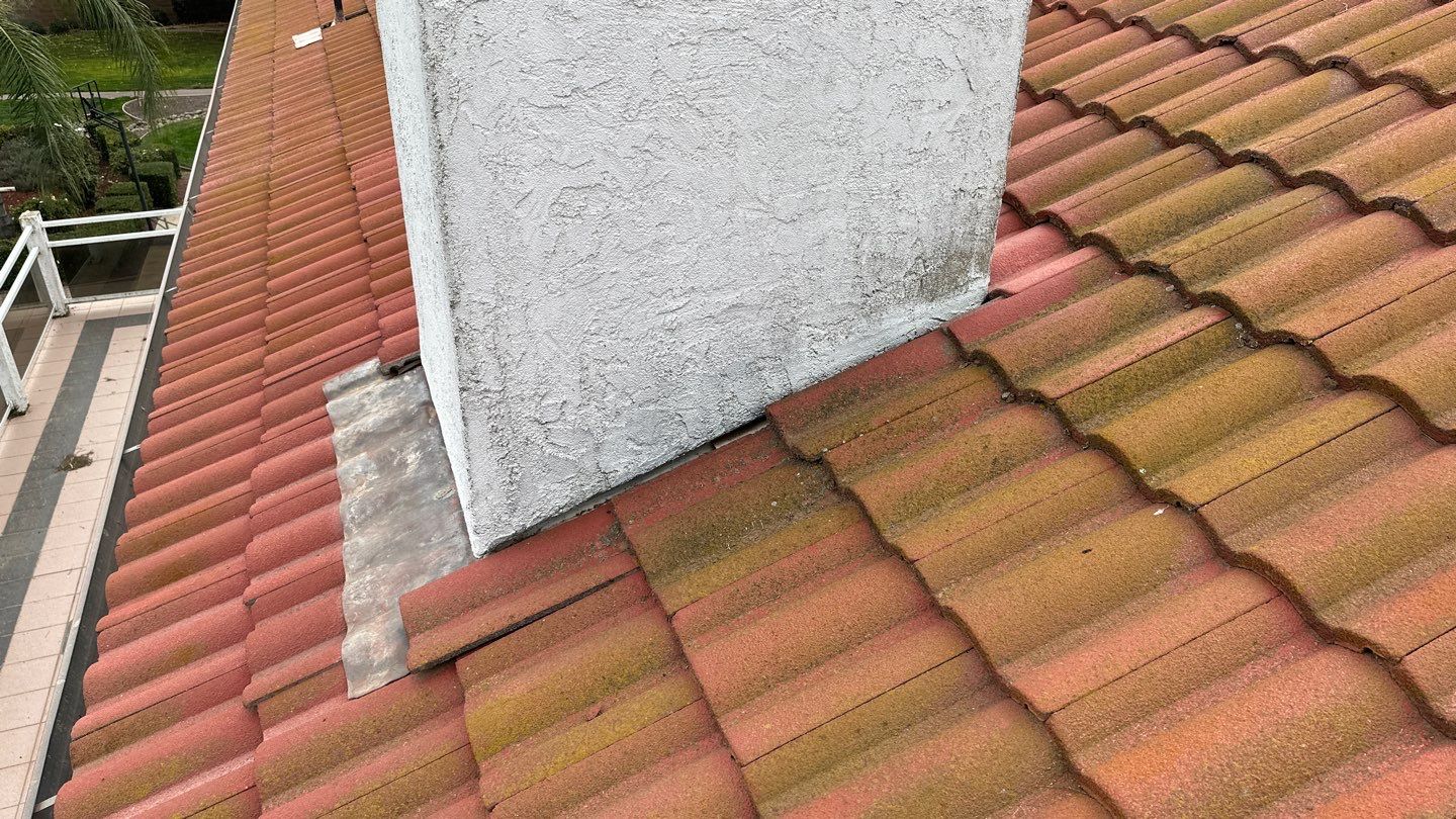 Tile refurbish project using existing tiles and replaced underlayment and battens by Straight Edge Roofing Inc