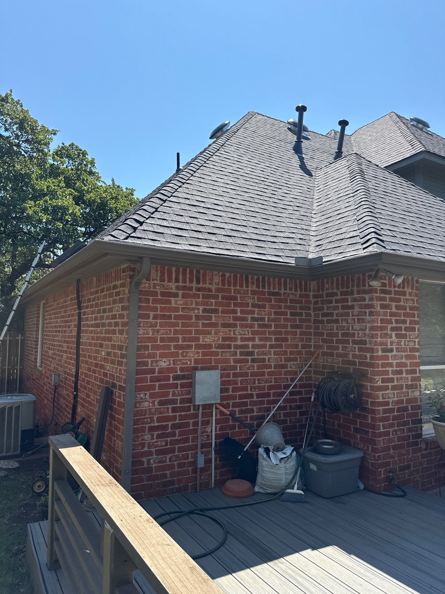 roof replacement & skylight repair in Edmond by McCann's Roofing and Construction