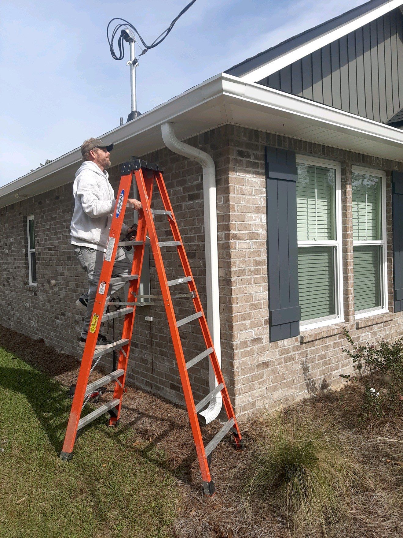 Seamless Gutter Installation Using White K-Style Gutters by Gutter Professors