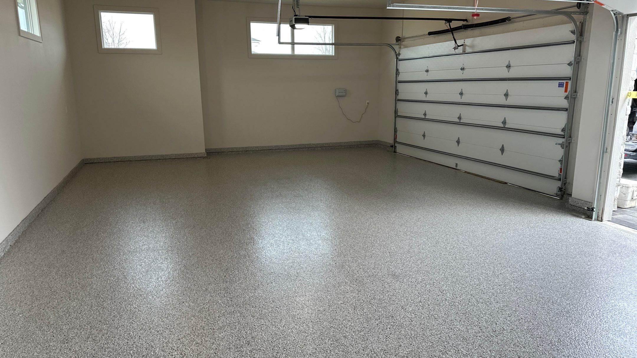 Coyote floors make a huge difference. Look!! by Banner Garage