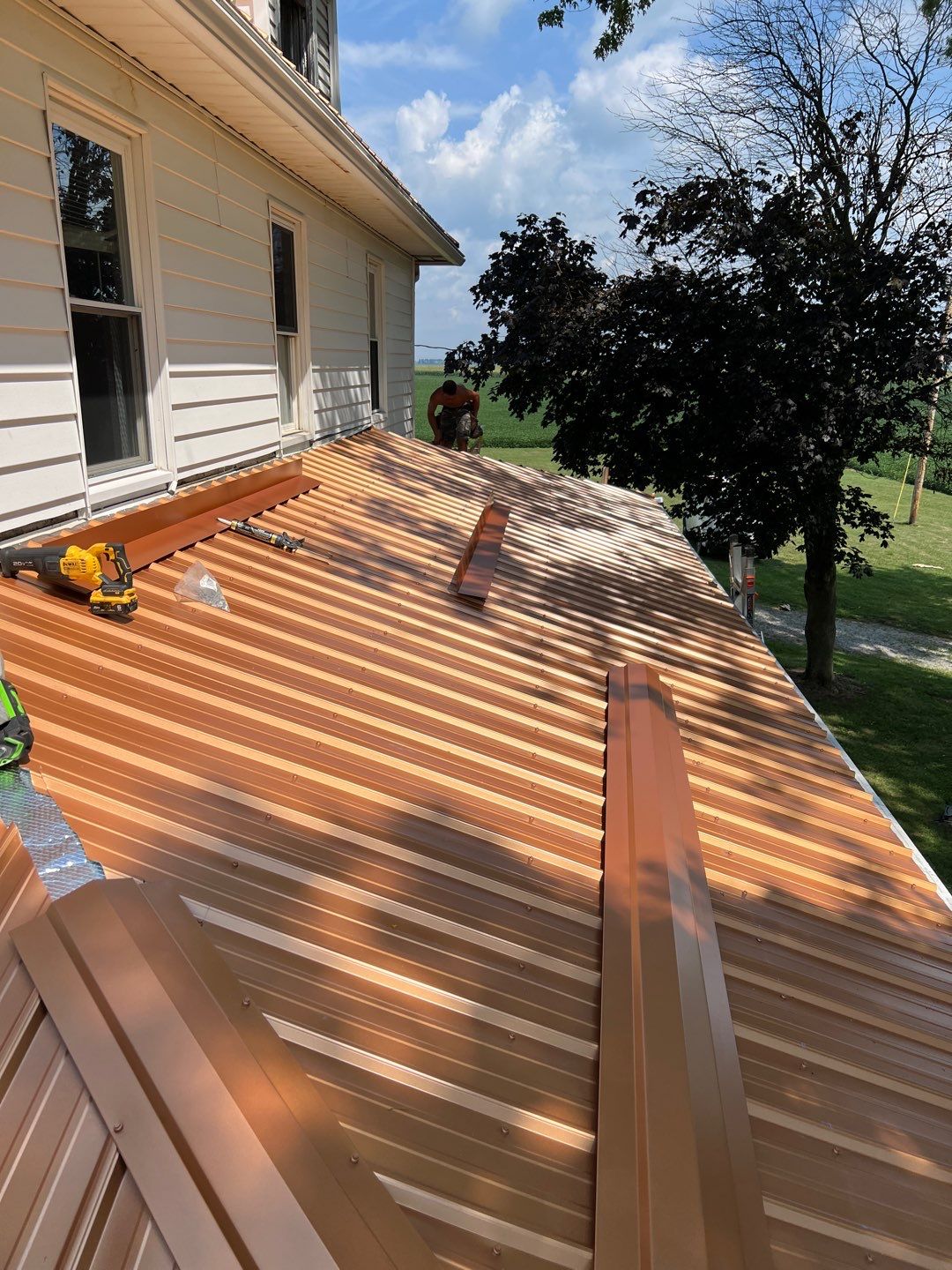 Residential Roofing Installation using Performance Panel Metal - Copper Metallic by RoofX 