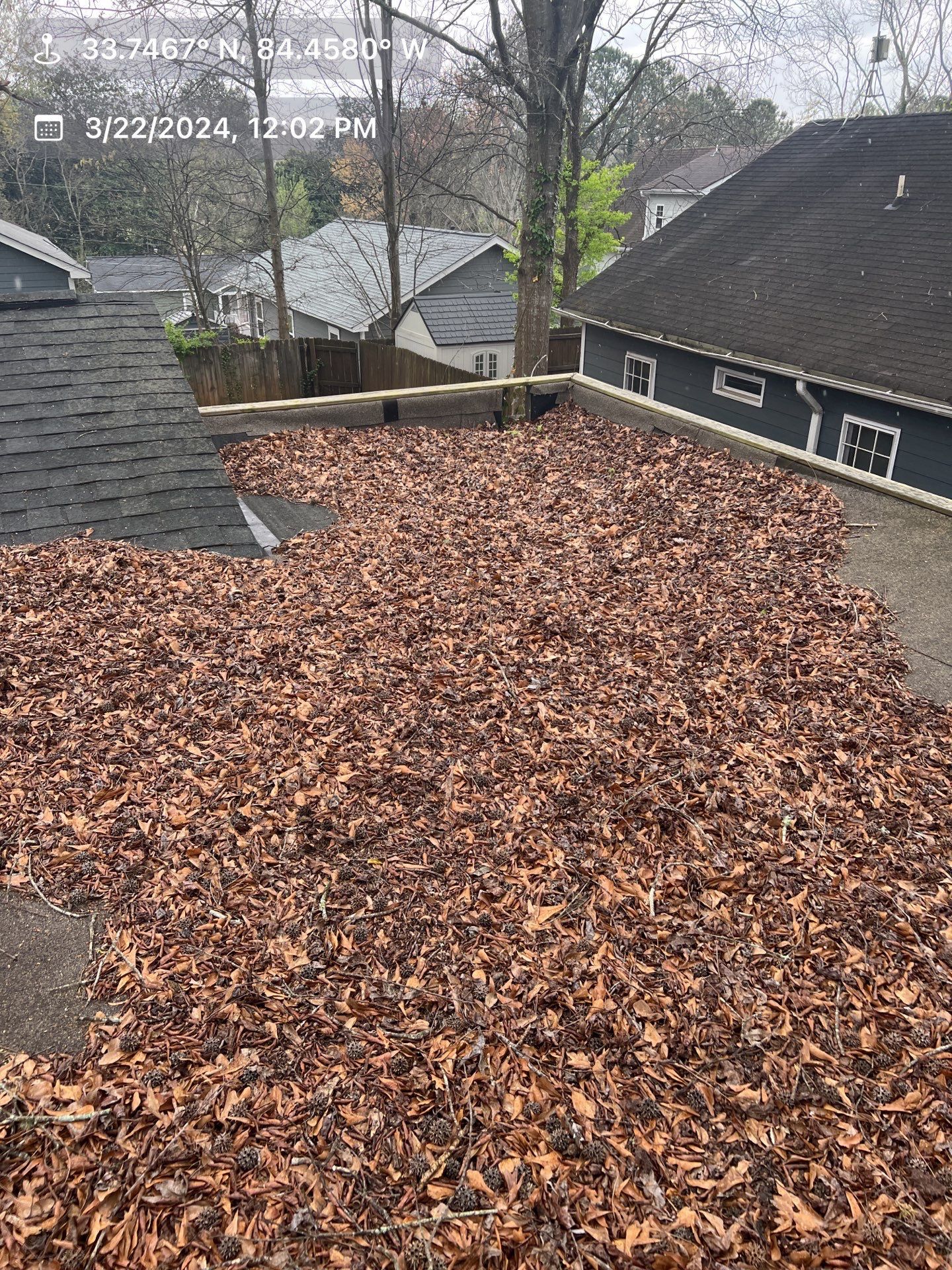 Gutter Cleaning using brown bags by Roof Bullies