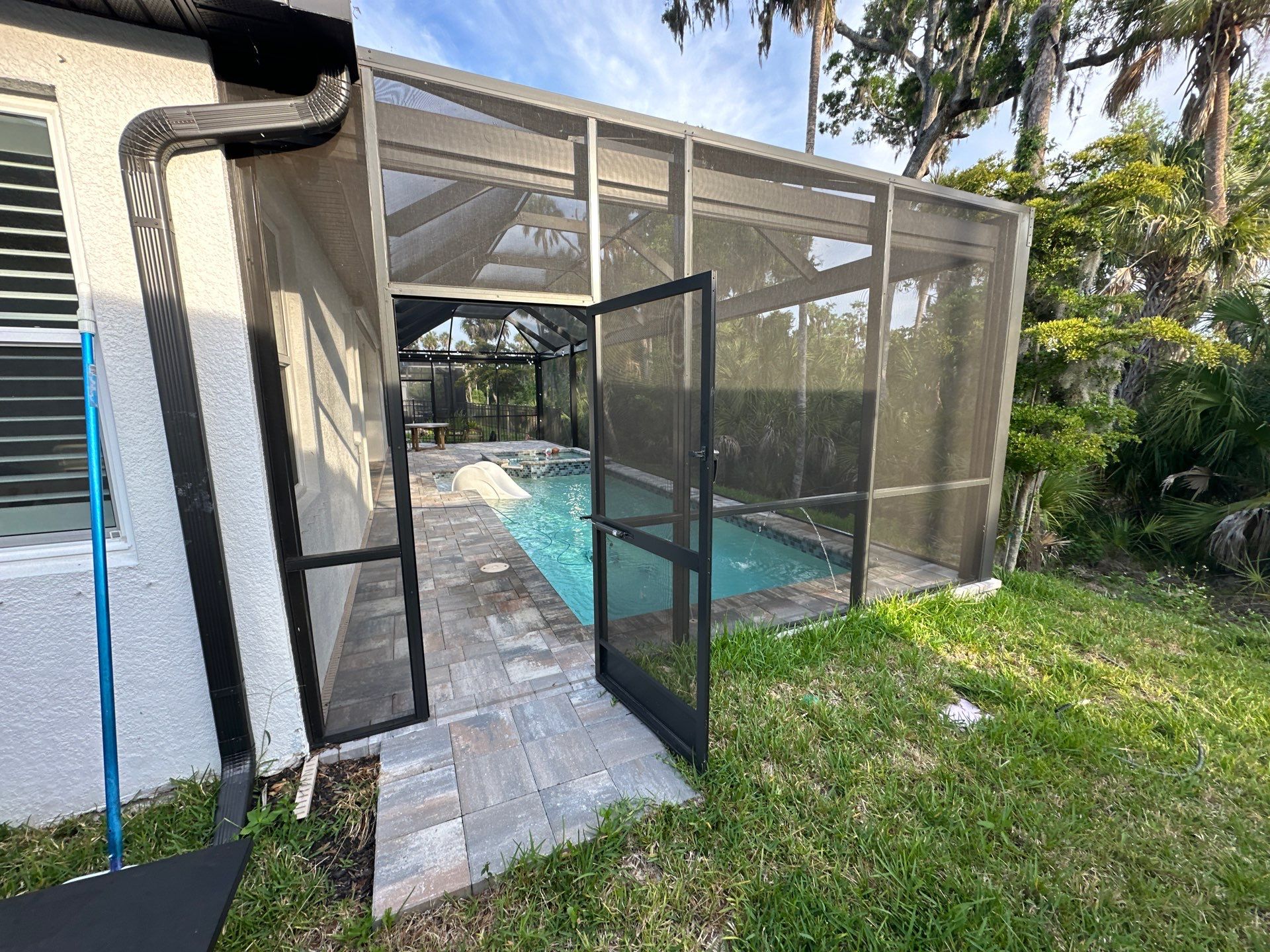 Screen Enclosure & Paver Pool Deck Cleaning in Trevesta Community, Palmetto, FL | Sunshine AquaWash by Sunshine AquaWash