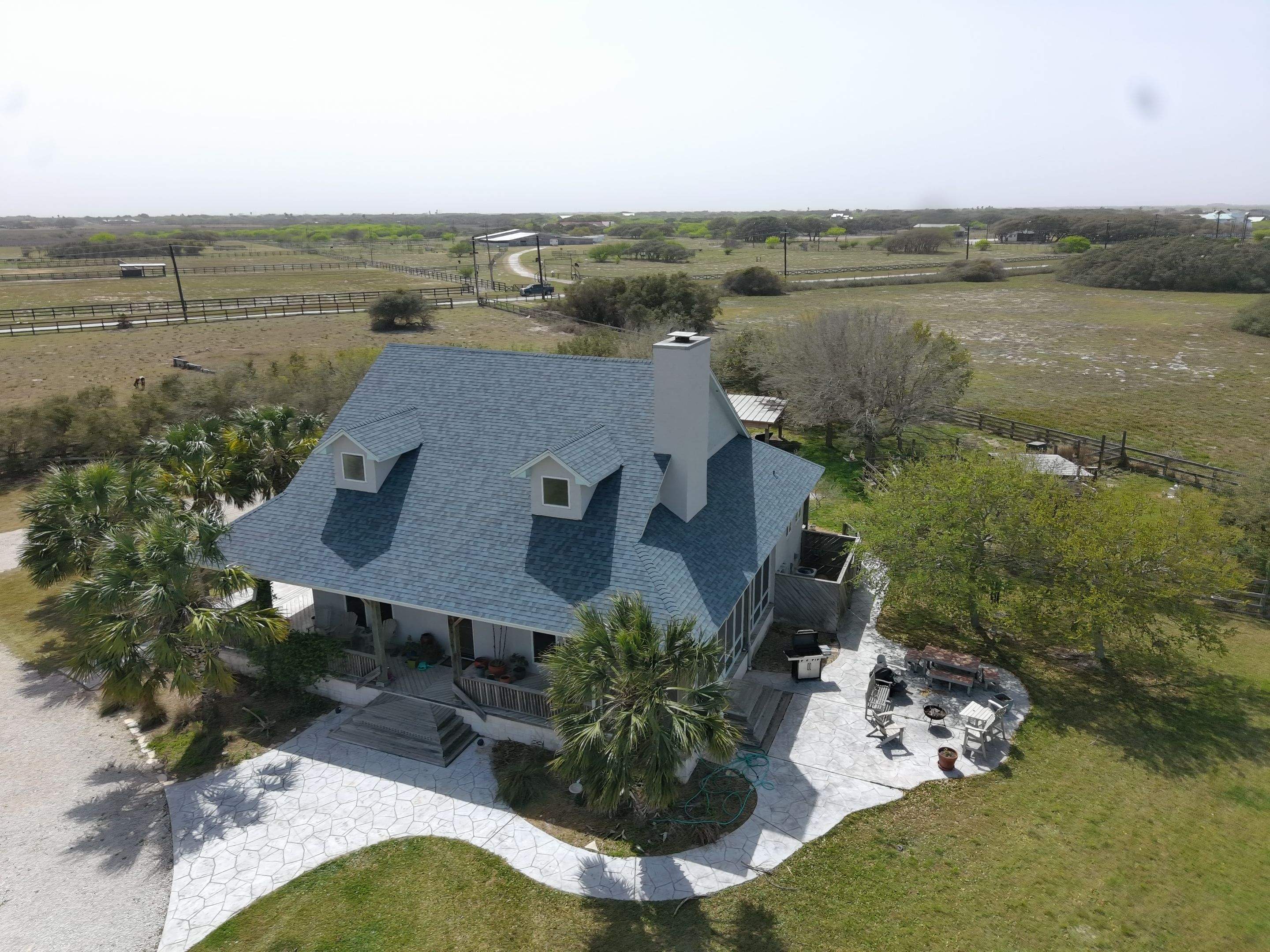 Long Horn Retreat by Bayfront Roofing and Construction