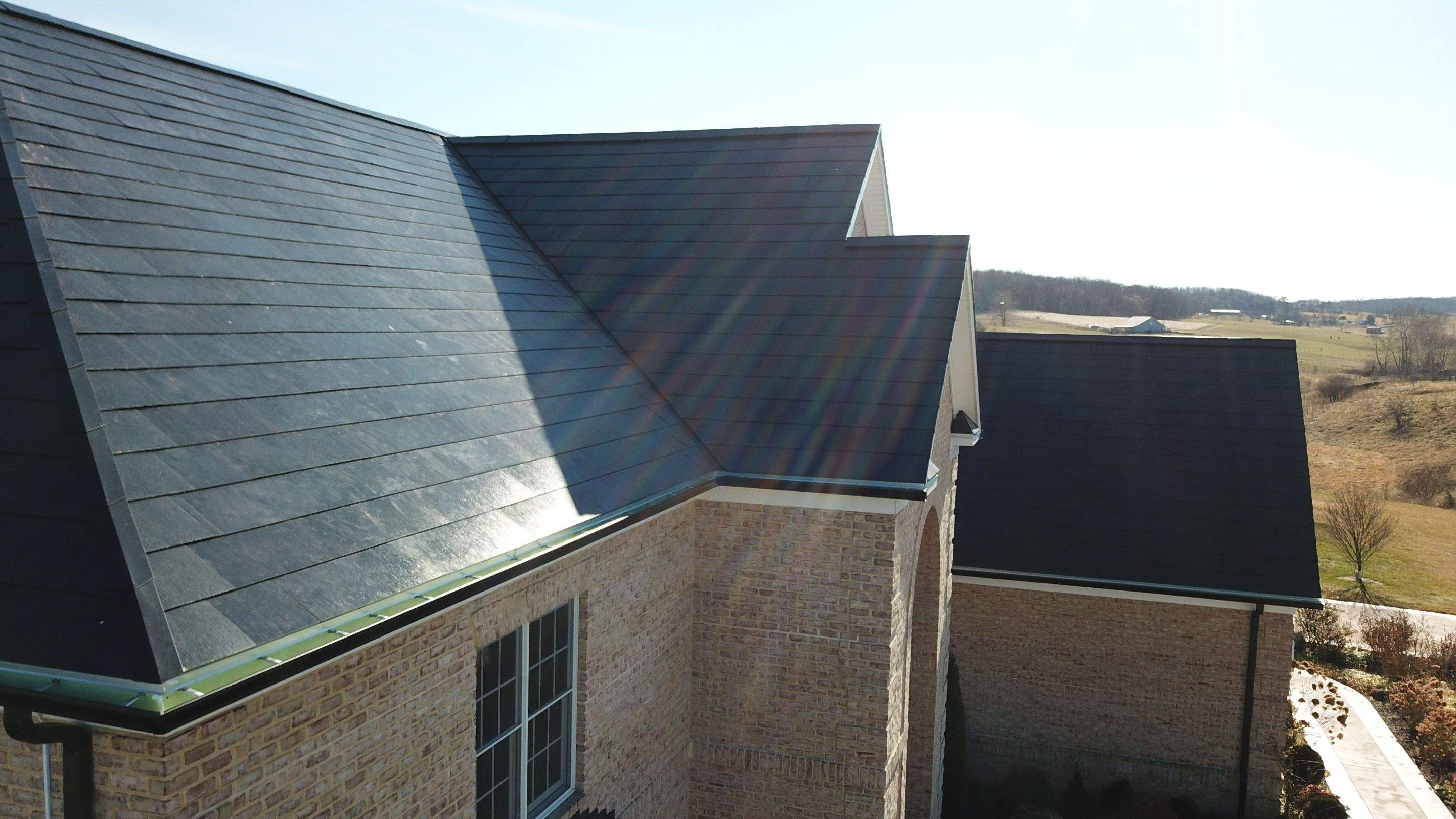 Tesla Solar Roof Replacement  by American Home Contractors