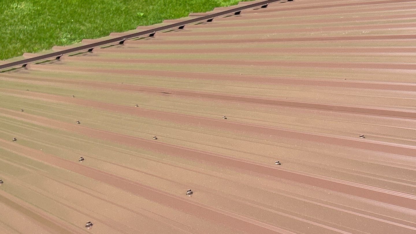Residential Roofing Installation using Performance Panel Metal - Coca Brown by RoofX 