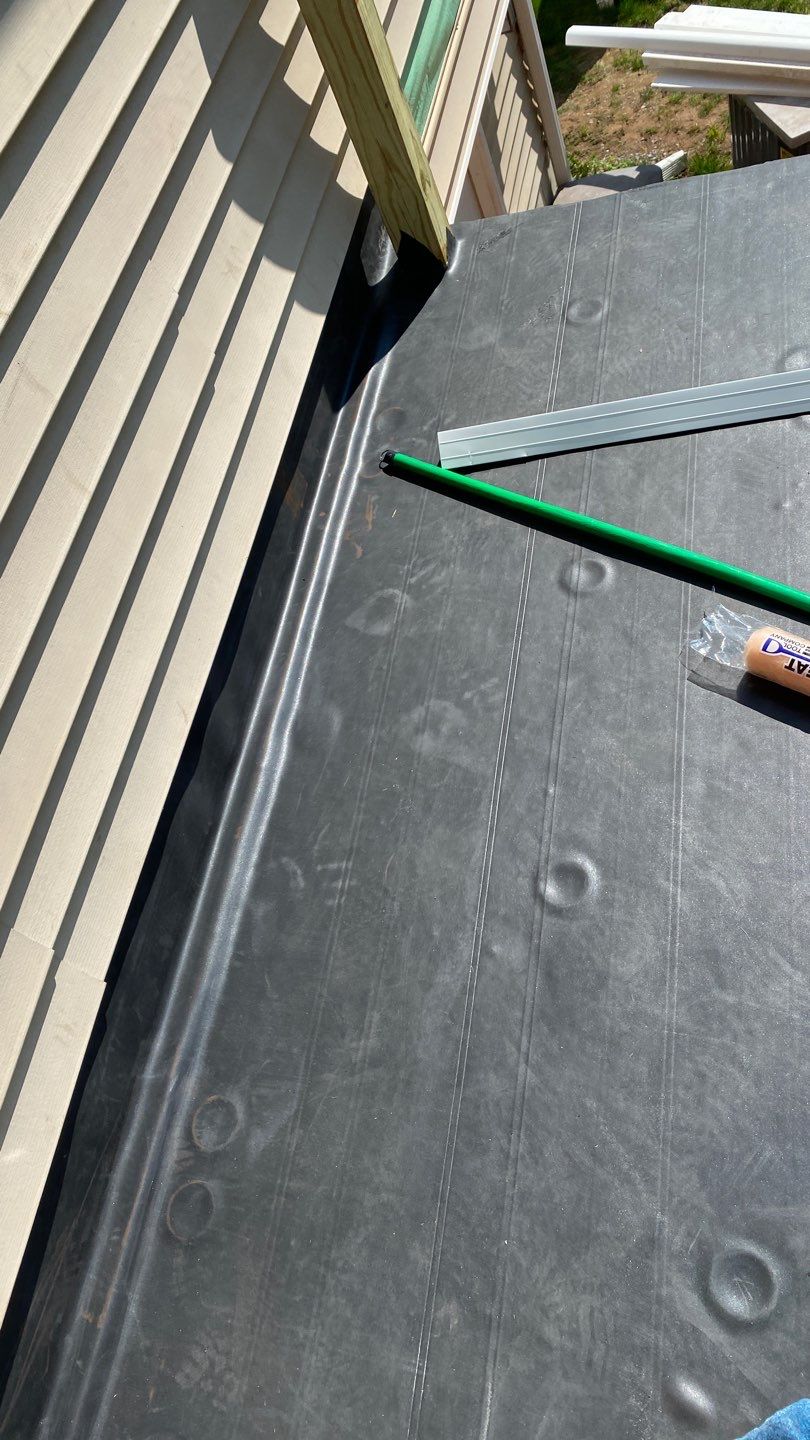 Siding Repair using Certainteed Mainsteet D4 and EPDM roof under deck by A Plus Exterior