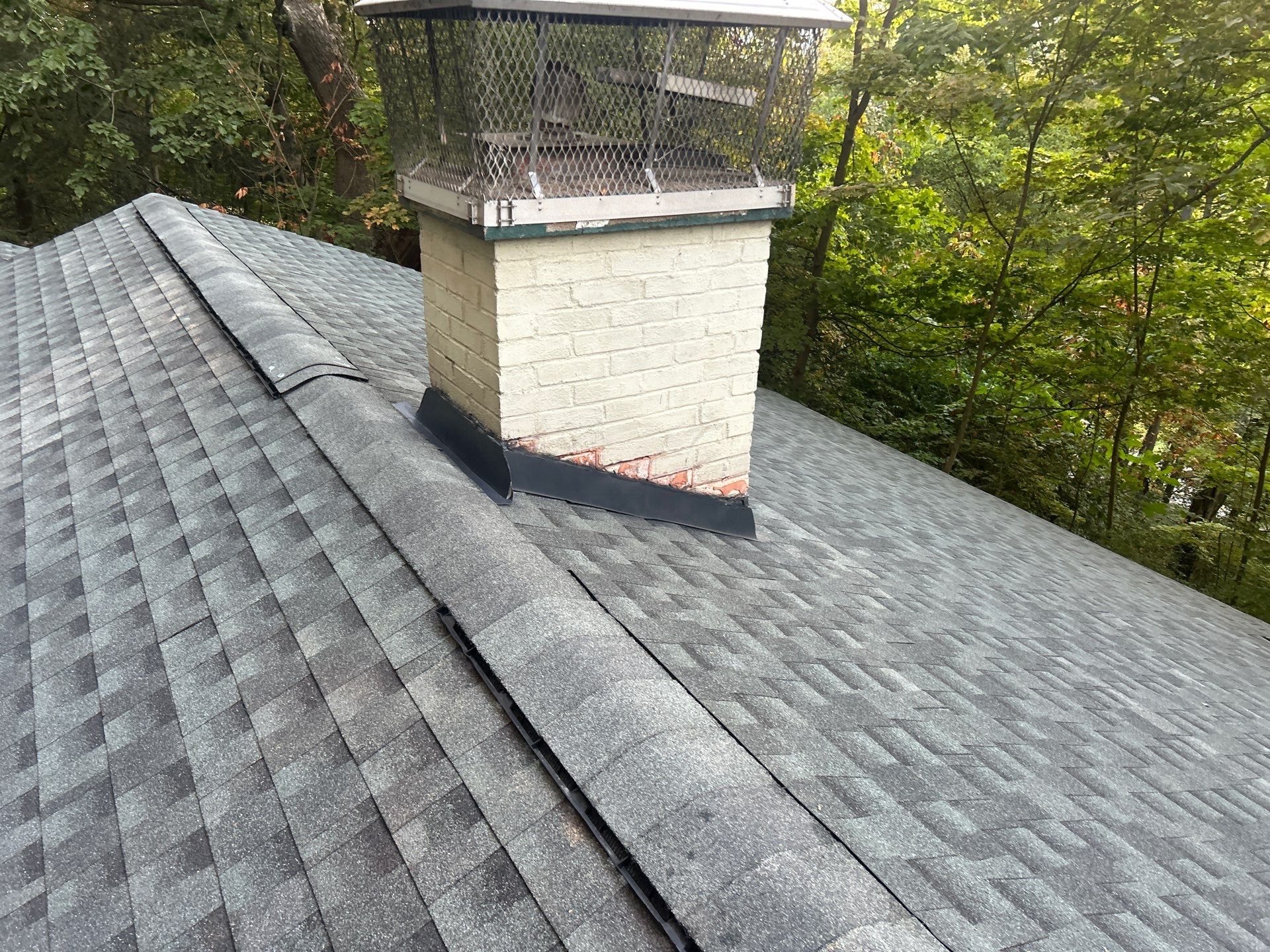 Residential Roofing Installation using GAF Timberline HDZ Williamsburg Slate by Rainstoppers Roofing