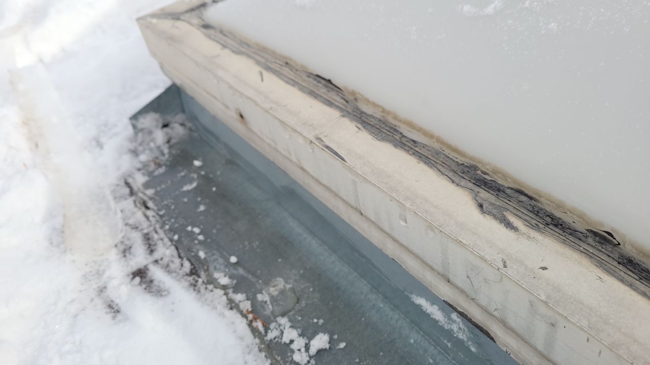 Skylight Removal using Shingle Repair by The Roof Doctor