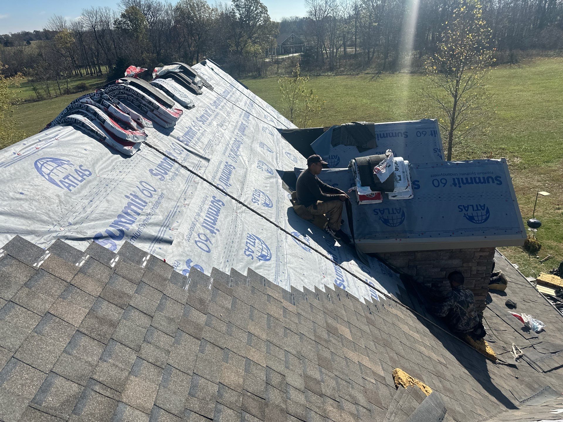 Residential Roof + Gutters & Downspouts Install  by Titan Commercial & Residential Roofing 