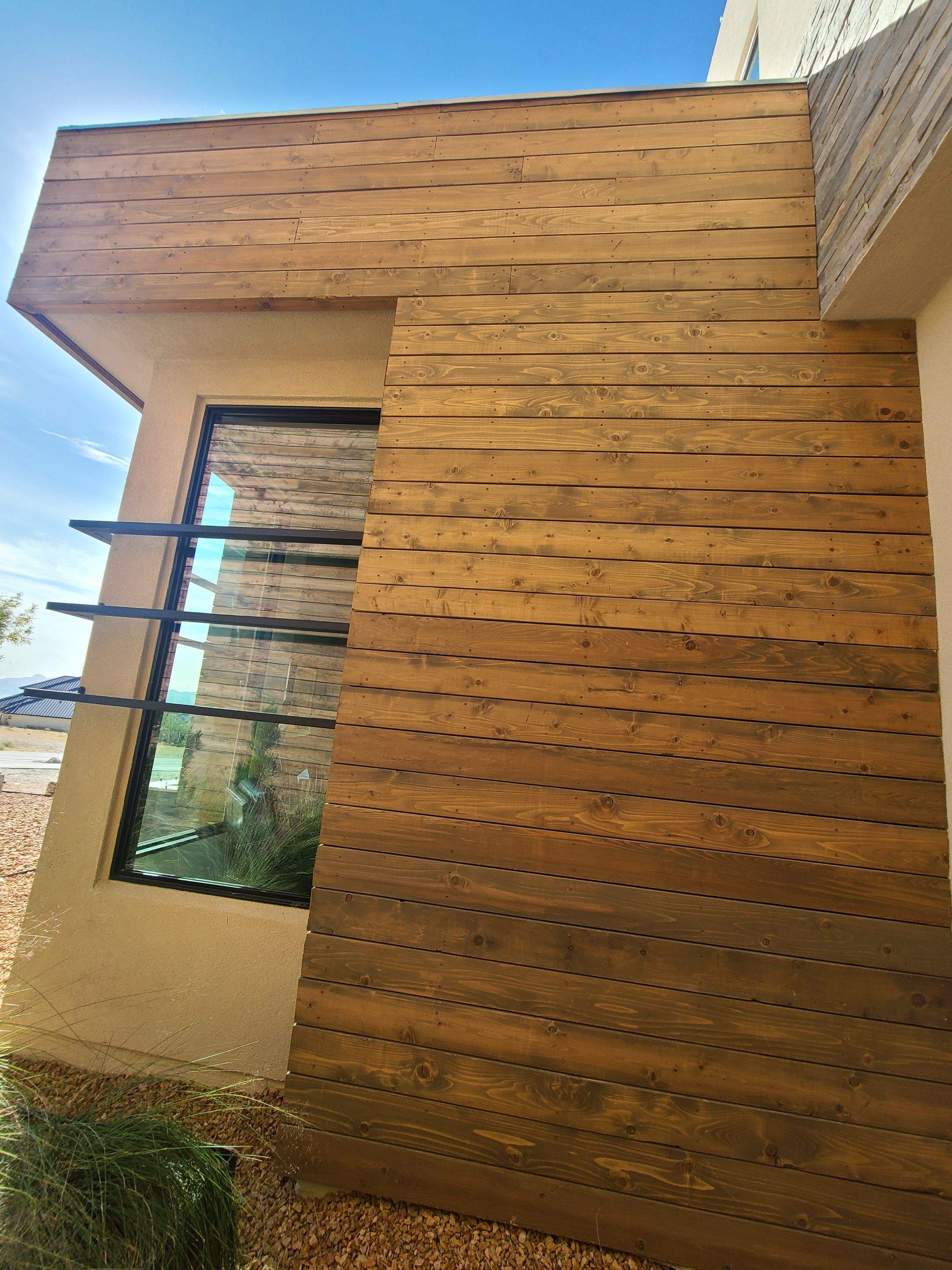 Exterior Wood Staining and Composite Decking Installation by Regal Renovate