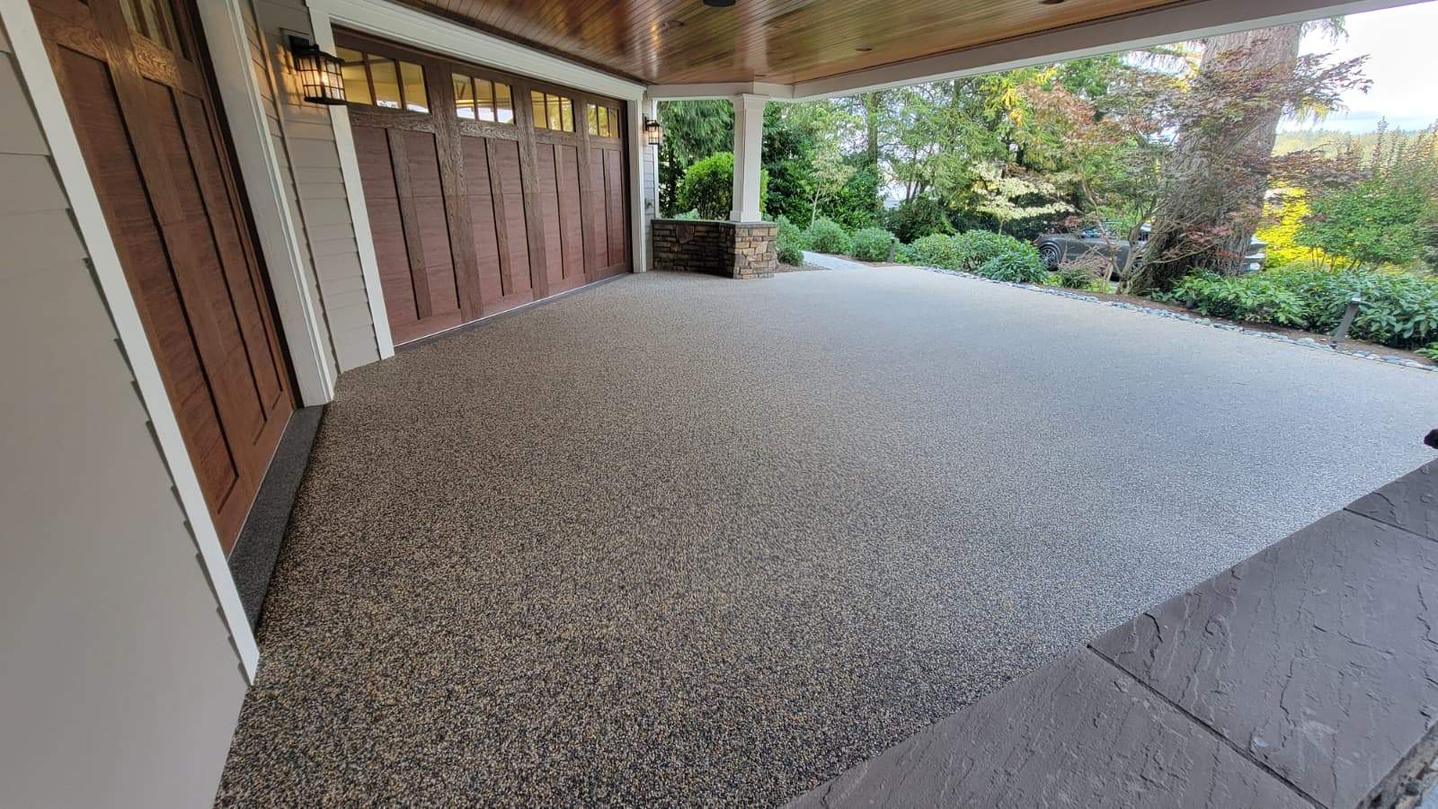 Coastal Grandeur Driveway and Patio in Big Sur Vuba Stone by Concrete Coating Experts Inc.