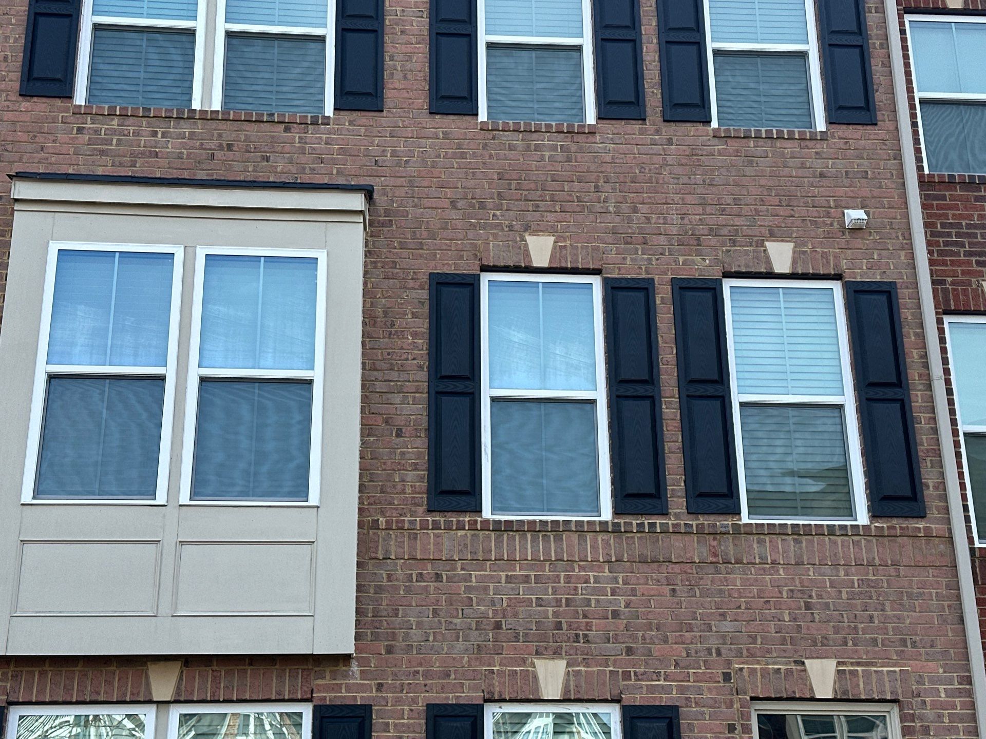 Black Shutters using Mid America Raised Panel by ExteriorPros