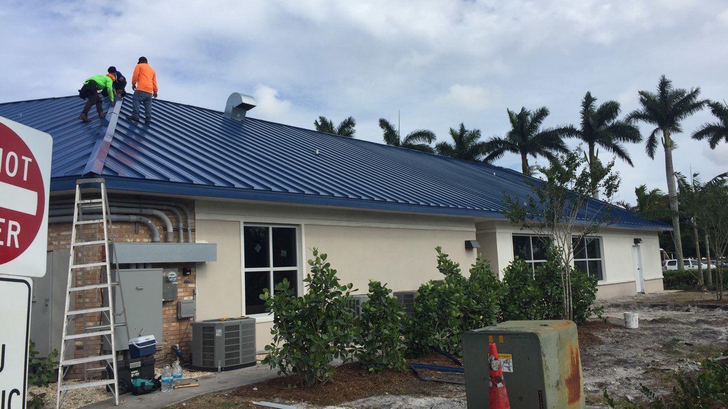 Residential Roofing Installation using 1.5'' Mechanical Seam by BLUES BROTHERS ROOFING