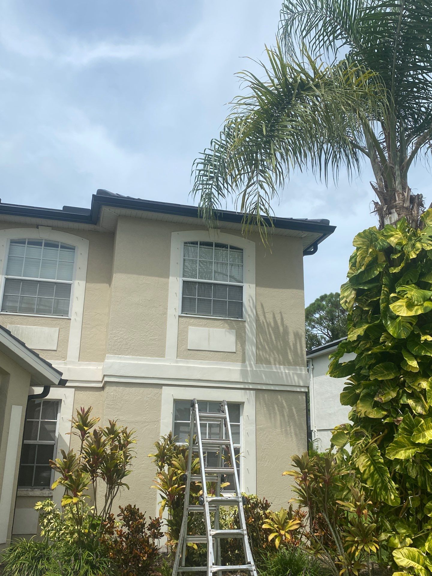 Black Seamless Gutters for Modern Homes in Osprey FL by Gutter Professors