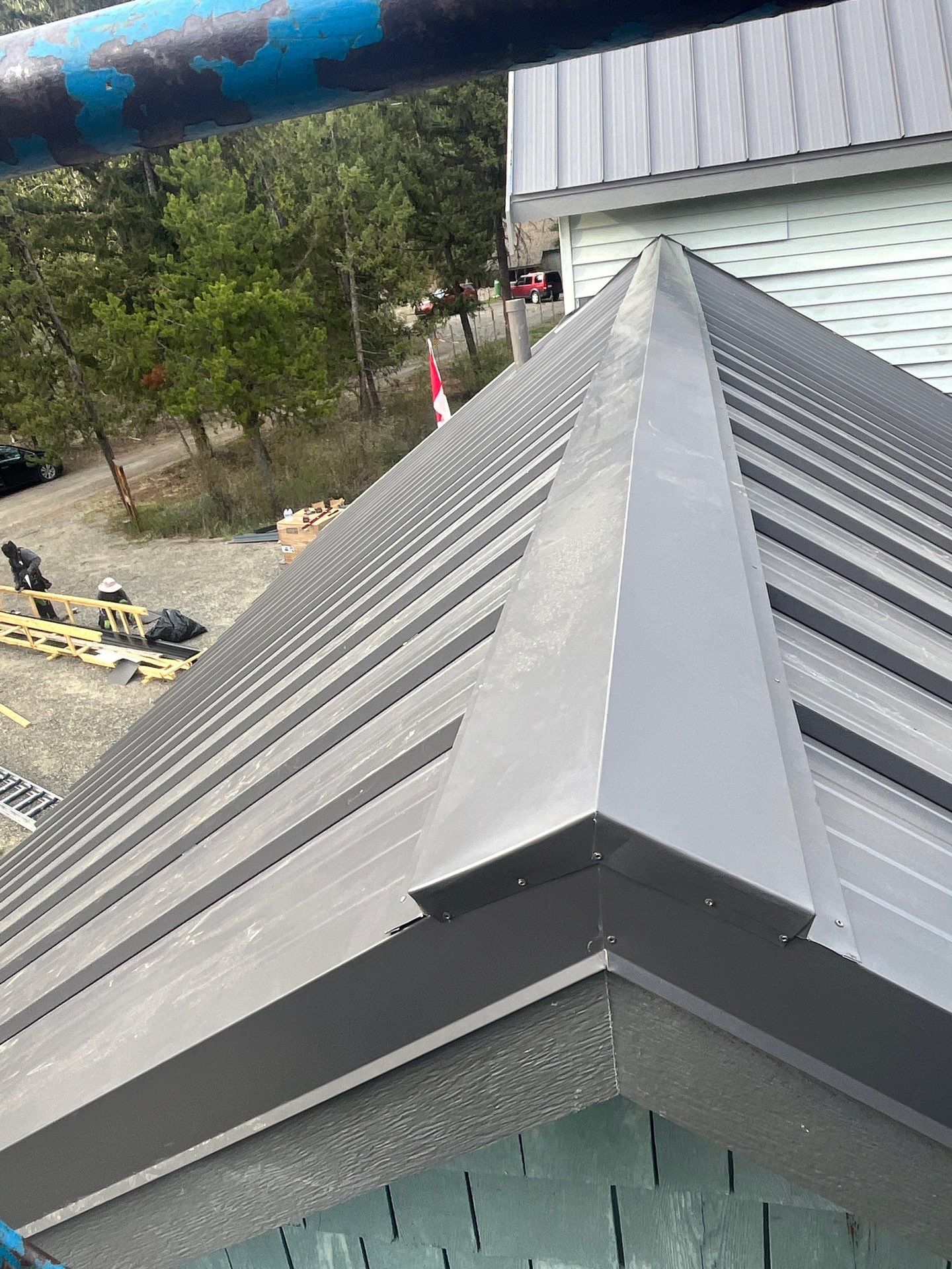 Shingle to Metal Roof Conversion by Top Notch Roofing Inc