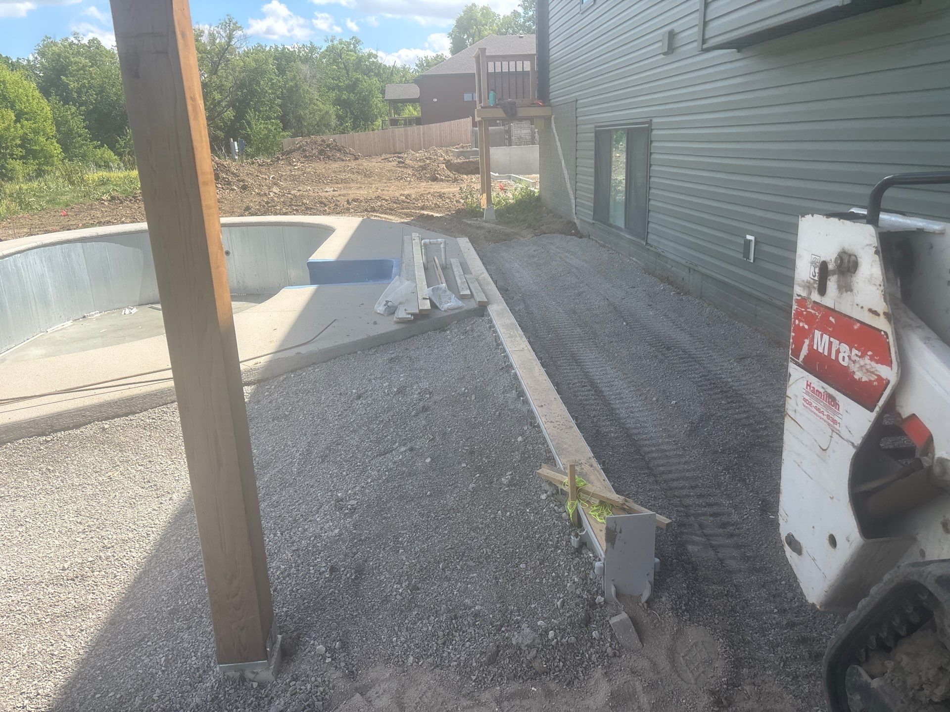 New Residential Construction - Paver, Putting Green, Pool by New Horizon Landscapes