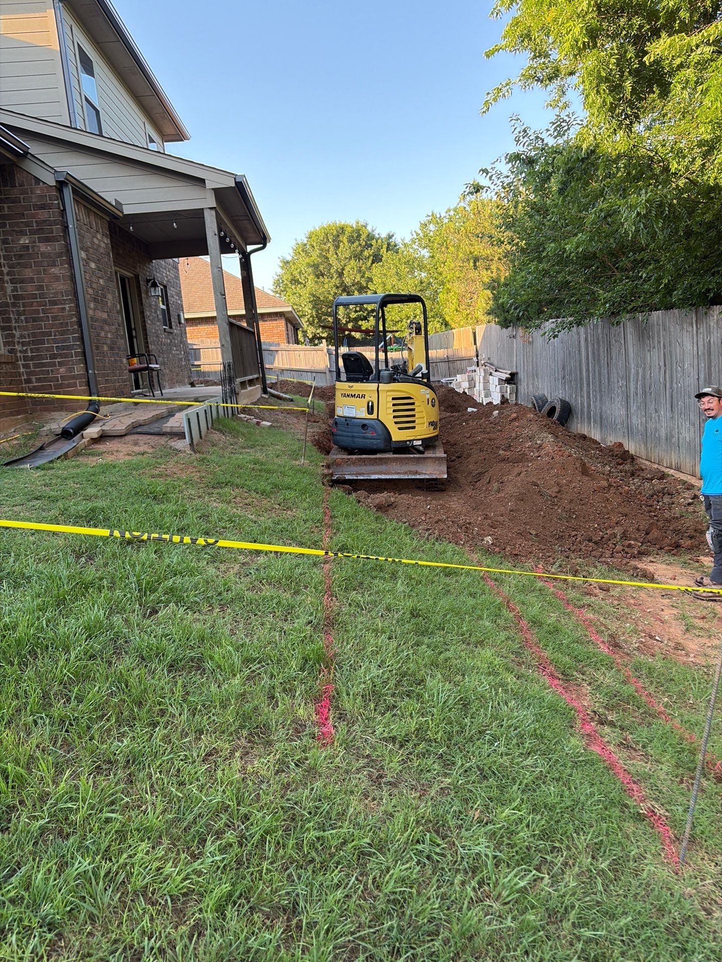 Custom Segmental Block Retaining Wall and Sod Installation in Lawton by Clays Services Inc