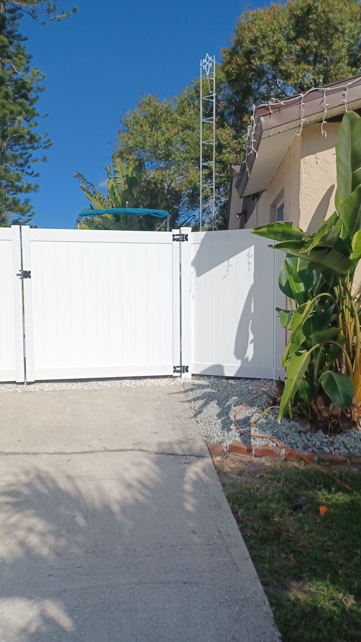Bradenton, FL 6ft. Tall White Vinyl Privacy & Board on Board Wood Fence by Asap fence and gates, LLC